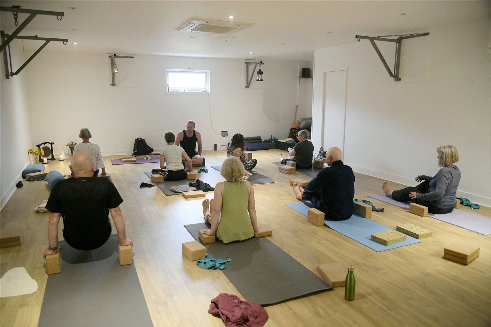 Paul Gibson, owner of Elgin Yoga Centre, in his studio space with a few of his clients. ..Picture: Beth Taylor.