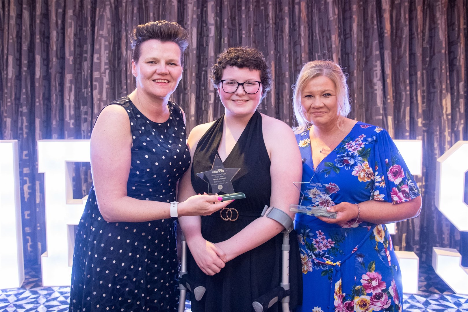 June Buchan and Emma McLauchlan are pictured with Abbie Howie (centre), who was named Secondary Pupil of the Year. Picture: Daniel Forsyth.