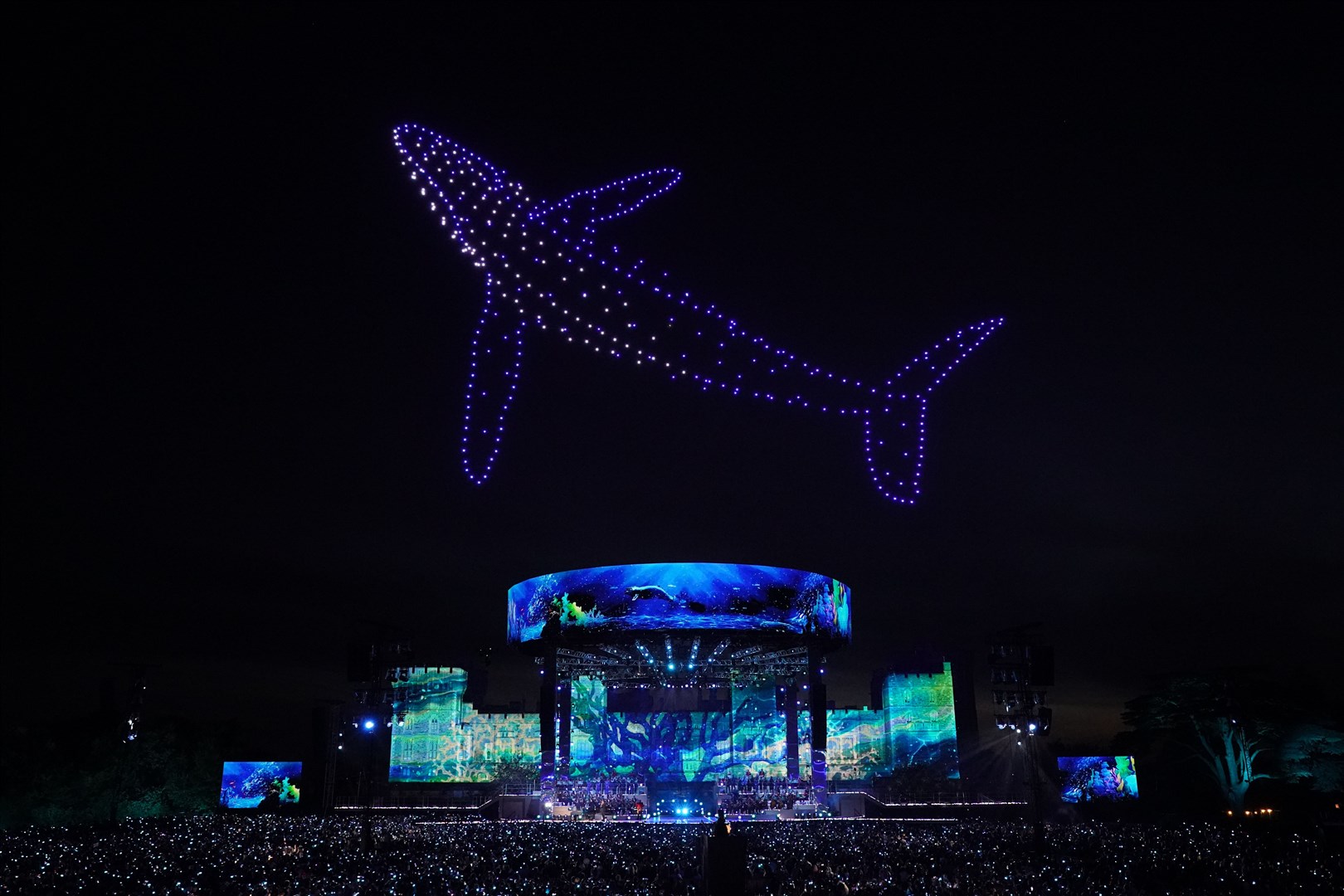 A drone light display at the coronation concert shows a whale soaring above the stage (Jonathan Brady/PA)