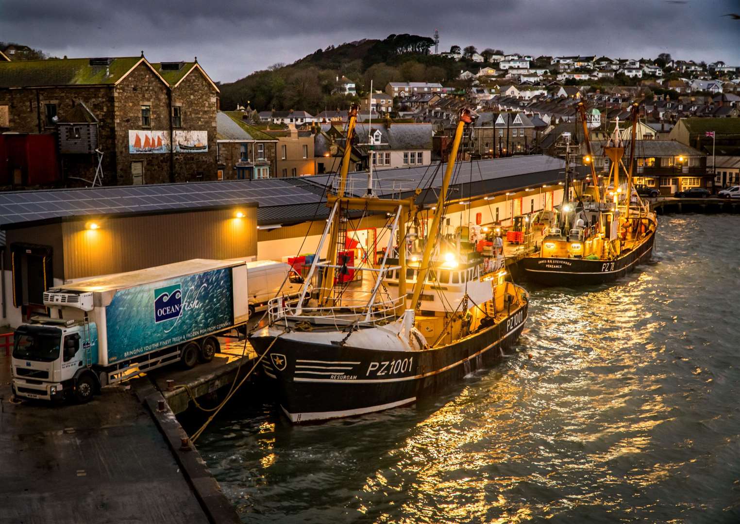 Beam Trawlers Landing to the Fish Market at Night, by Laurence Hartwell