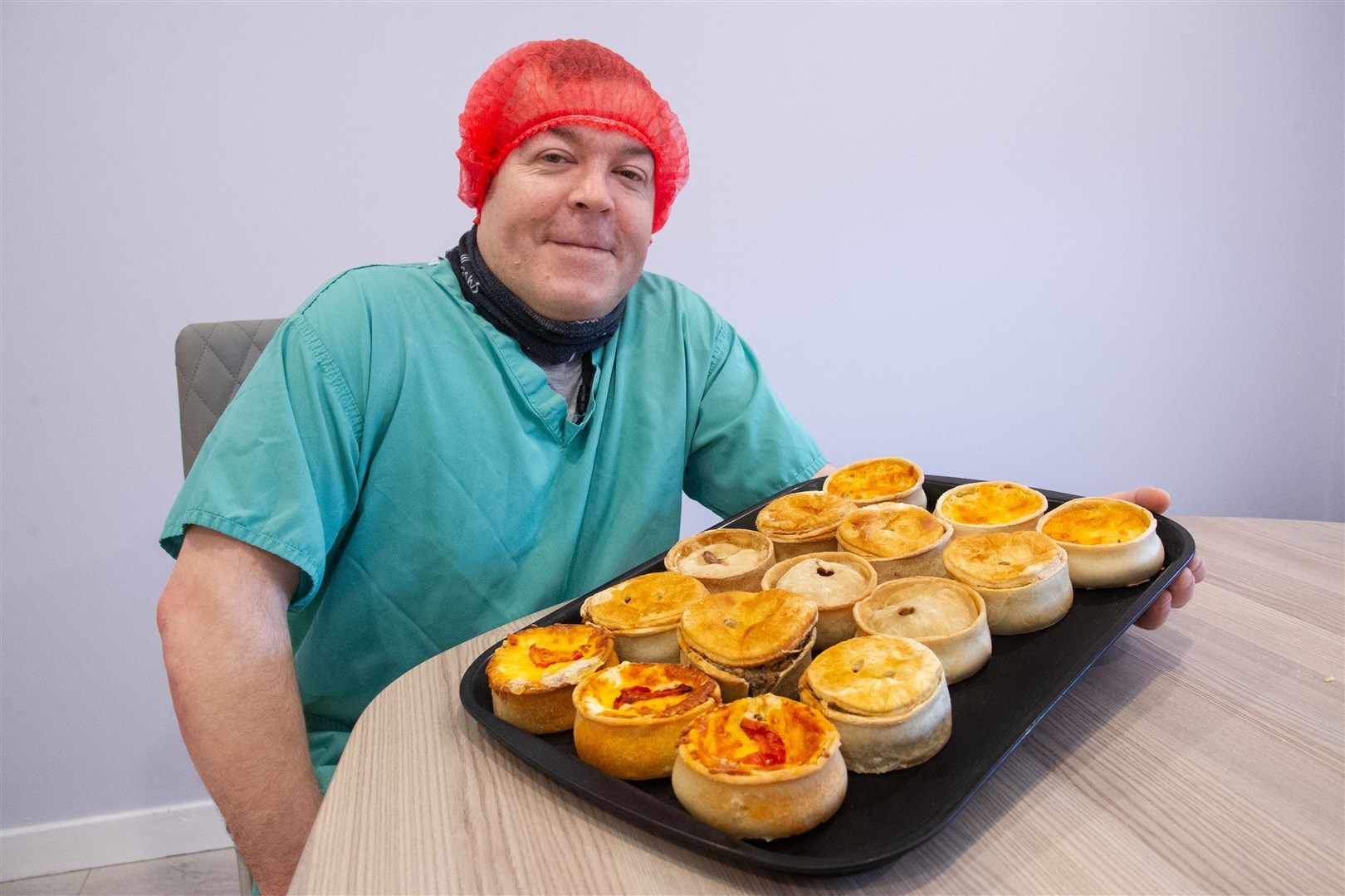 Michael Baranski with a tray of the pies that Maclean's Highland Bakery previously entered into the World Pie Championships. ..Picture: Daniel Forsyth..