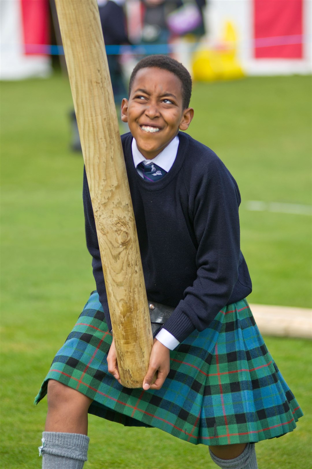 A pupil from Gordonstoun's Junior School tosses the caber during last year's event.