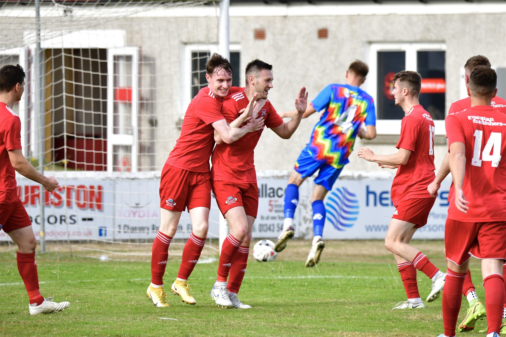 Dean Stewart is congrulated by his team mates after his goal. Picture: Daniel Forsyth