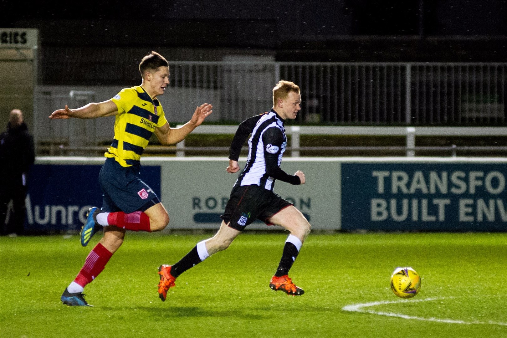 Russell Dingwall breaks through on his way to scoring Elgin City's first goal. Picture: Daniel Forsyth..