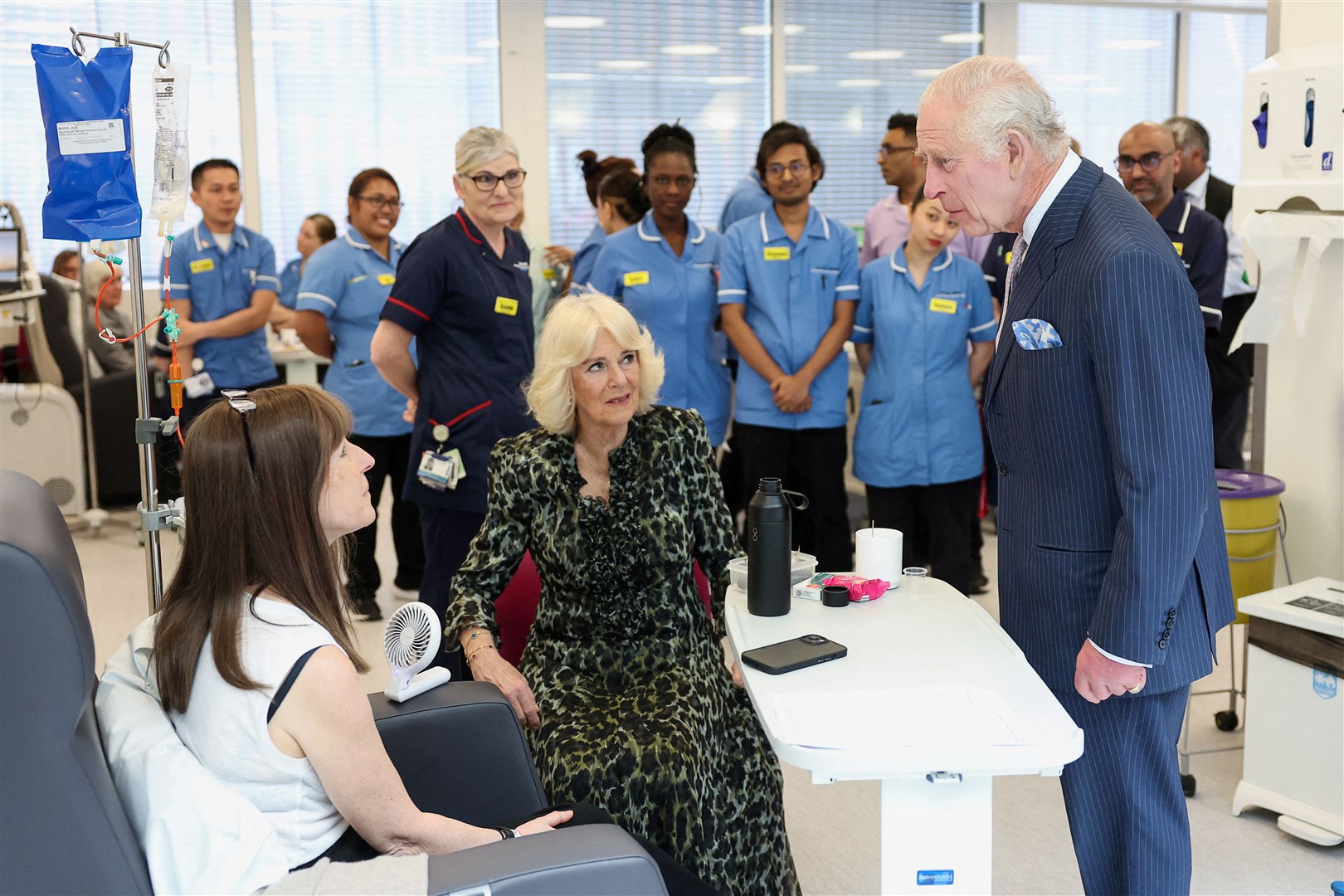 The royal couple chat to a patient at the University College Hospital Macmillan Cancer Centre, (Suzanne Plunkett/PA)