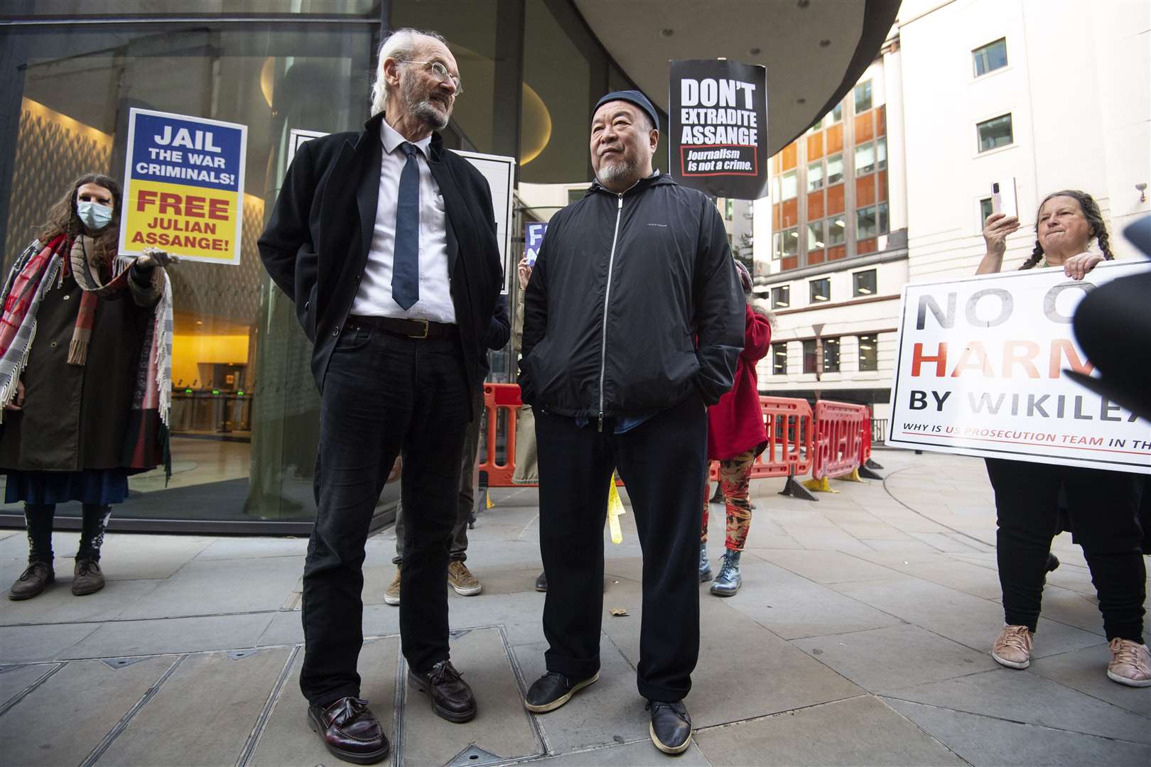 Julian Assange’s father John Shipton with artist Ai Weiwei after a silent protest outside the Old Bailey in London (Victoria Jones/PA)