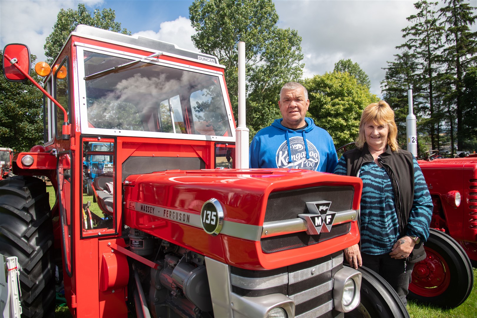 Kenny and Irene McDonald with their Massey Ferguson 135. Picture: Daniel Forsyth