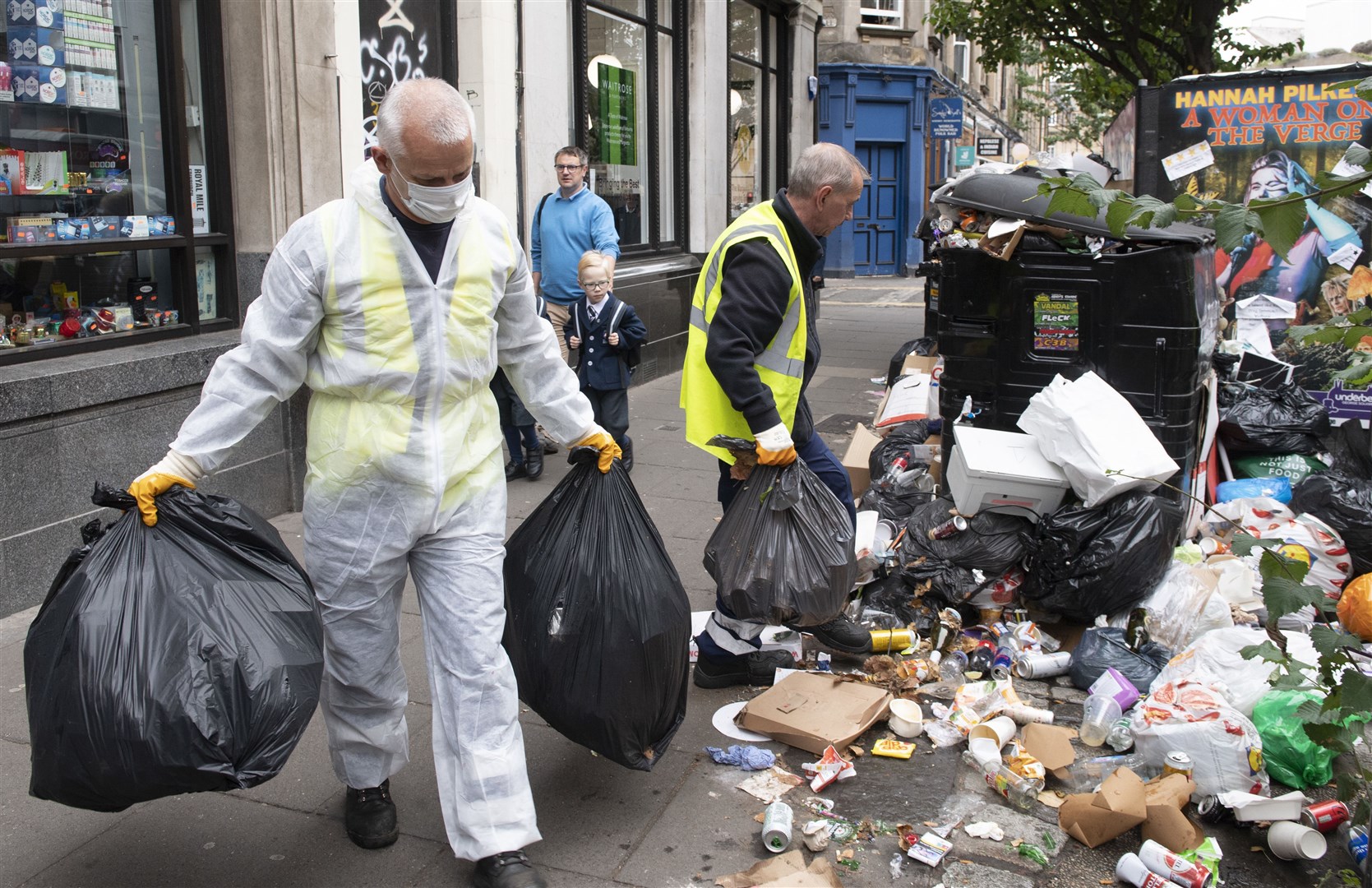 The strikes coincided with action in Edinburgh which left the streets littered with rubbish (Lesley Martin/PA)