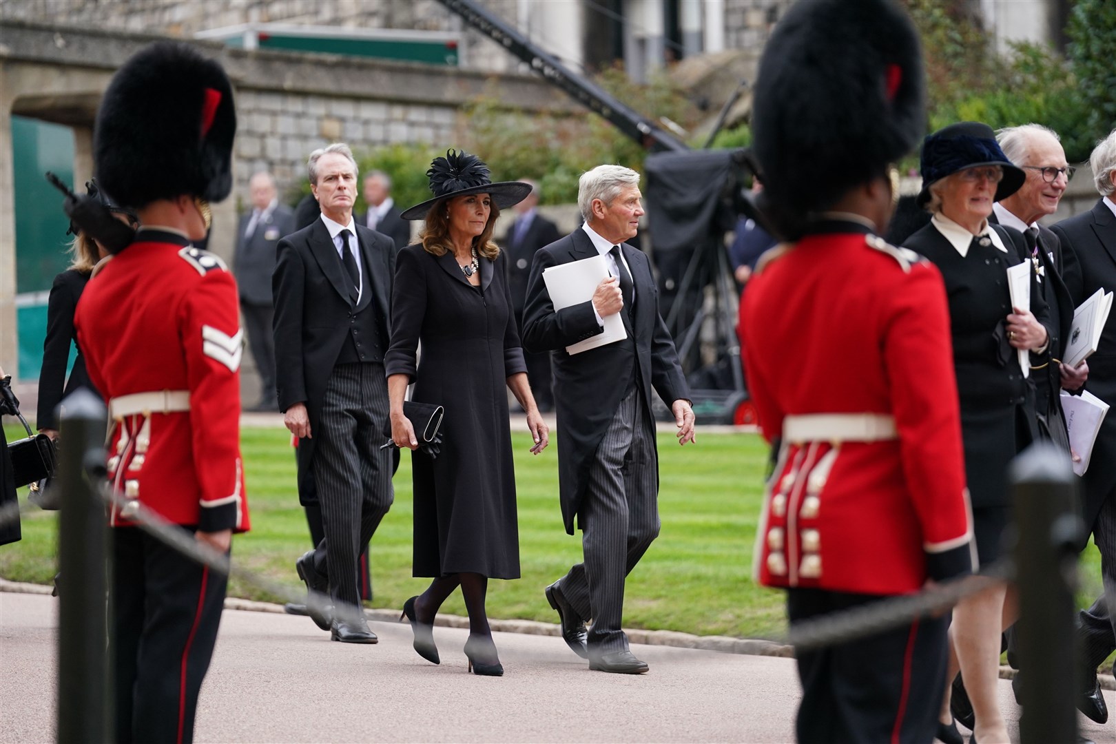 The parents of the Princess of Wales, Carole and Michael Middleton, arrive for the committal service (Kirsty O’Connor/PA)