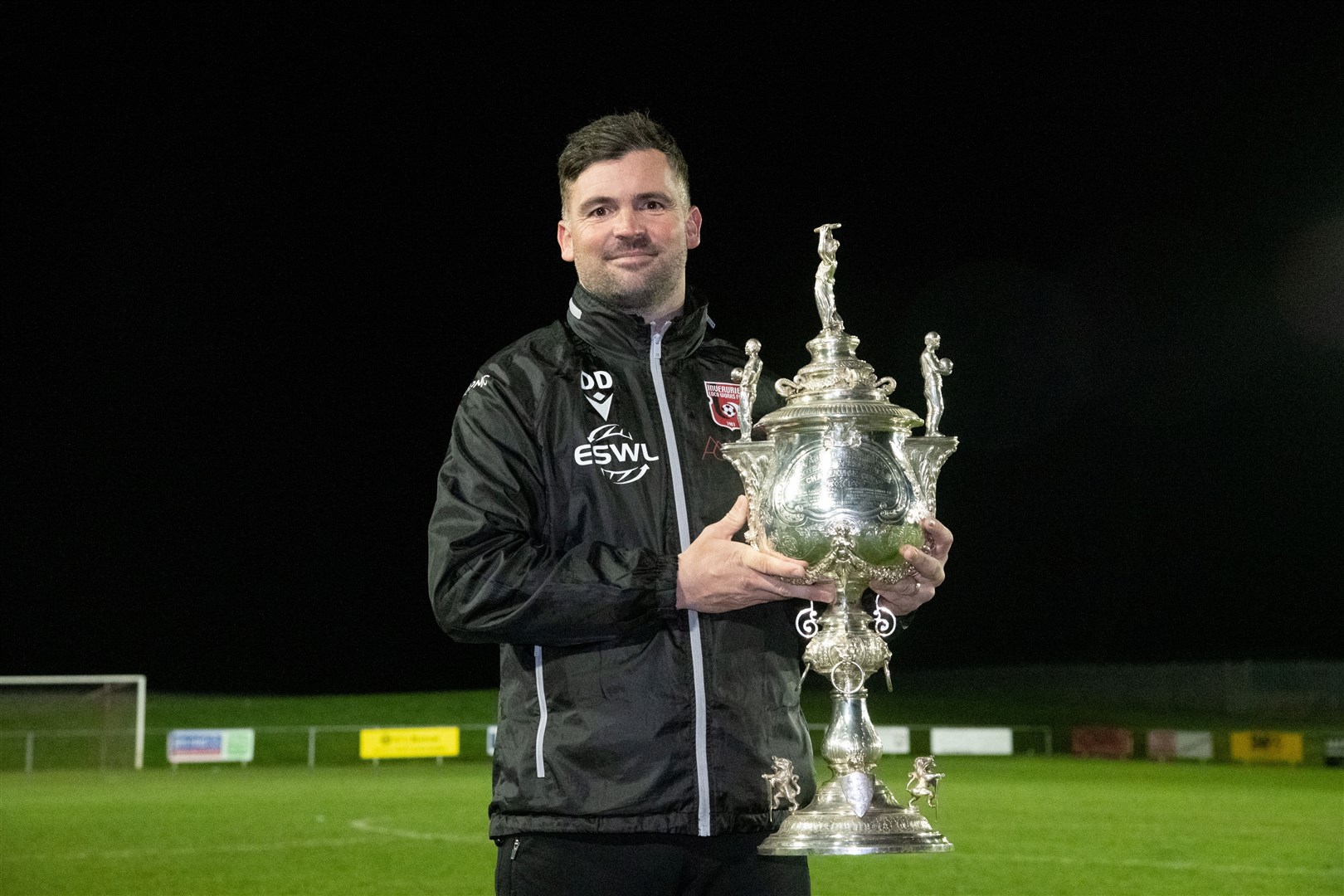 Inverurie Locos manager Dean Donaldson with the Aberdeenshire Cup. Picture: Daniel Forsyth.