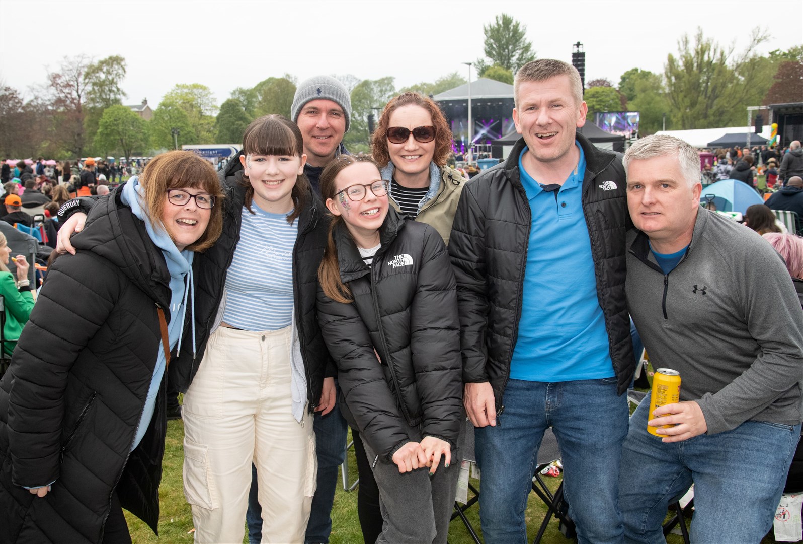 Steven Watson (second right) with family and friends at the festival.MacMoray Music Festival 2024, held at Cooper Park, Elgin. Picture: Daniel Forsyth.