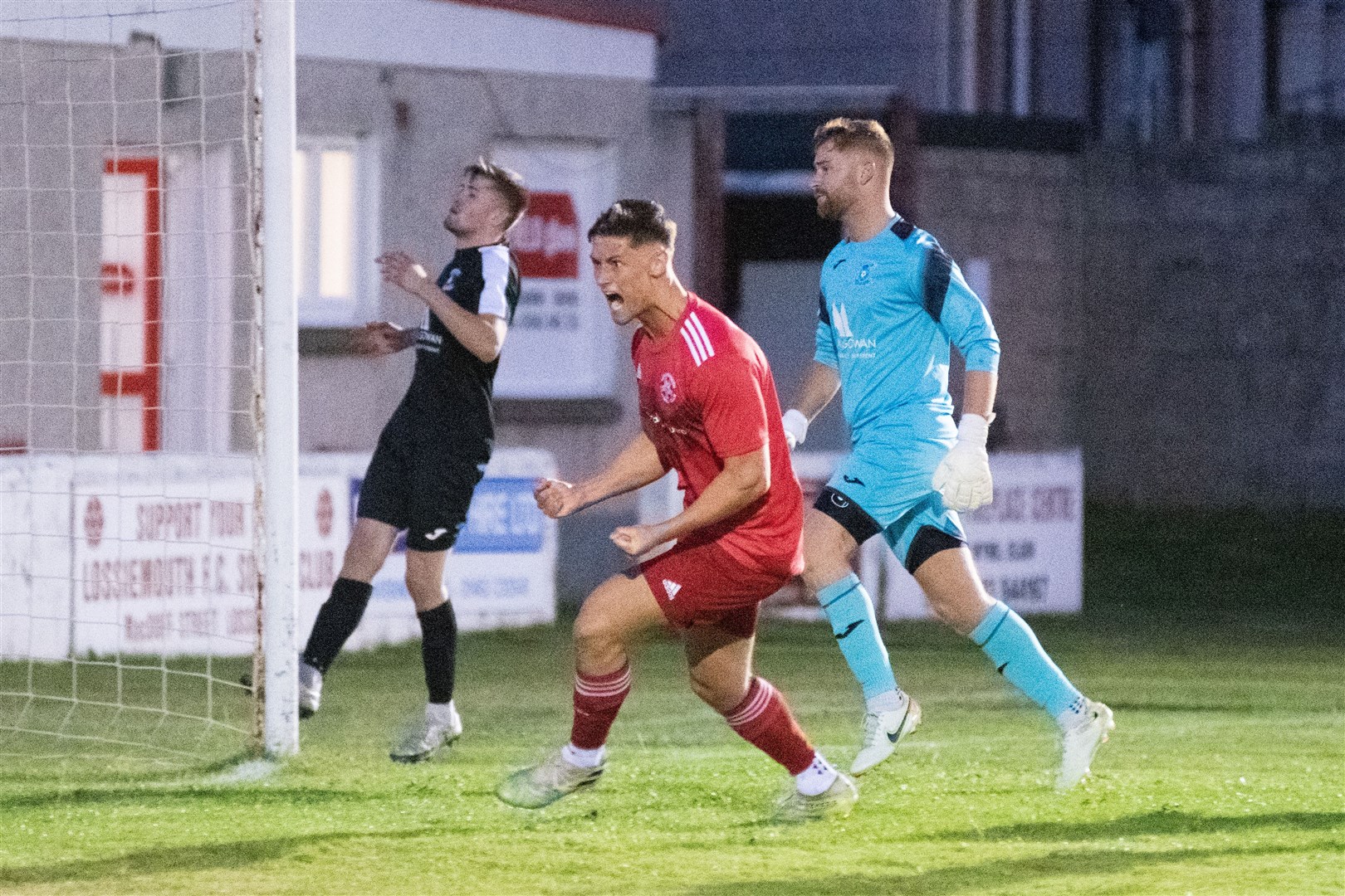 A roar of delight from Lossiemouth winger Ross Elliott as he scores the Coasters second goal of the evening...Lossiemouth FC (4) vs Strathspey Thistle (2) - Highland Football League 22/23 - Grant Park, Lossiemouth 24/08/2022...Picture: Daniel Forsyth..