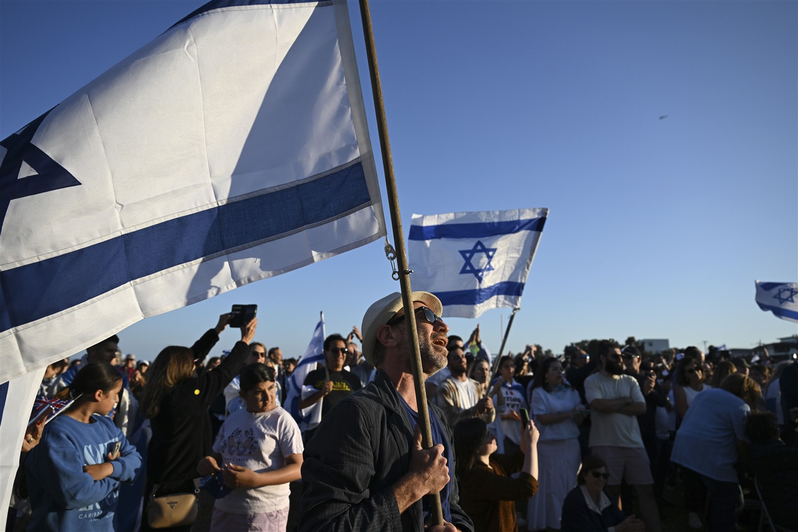 People attend a vigil in Sydney, Australia, for Israeli victims of Hamas attacks.(Dean Lewins/AAP Image via AP)