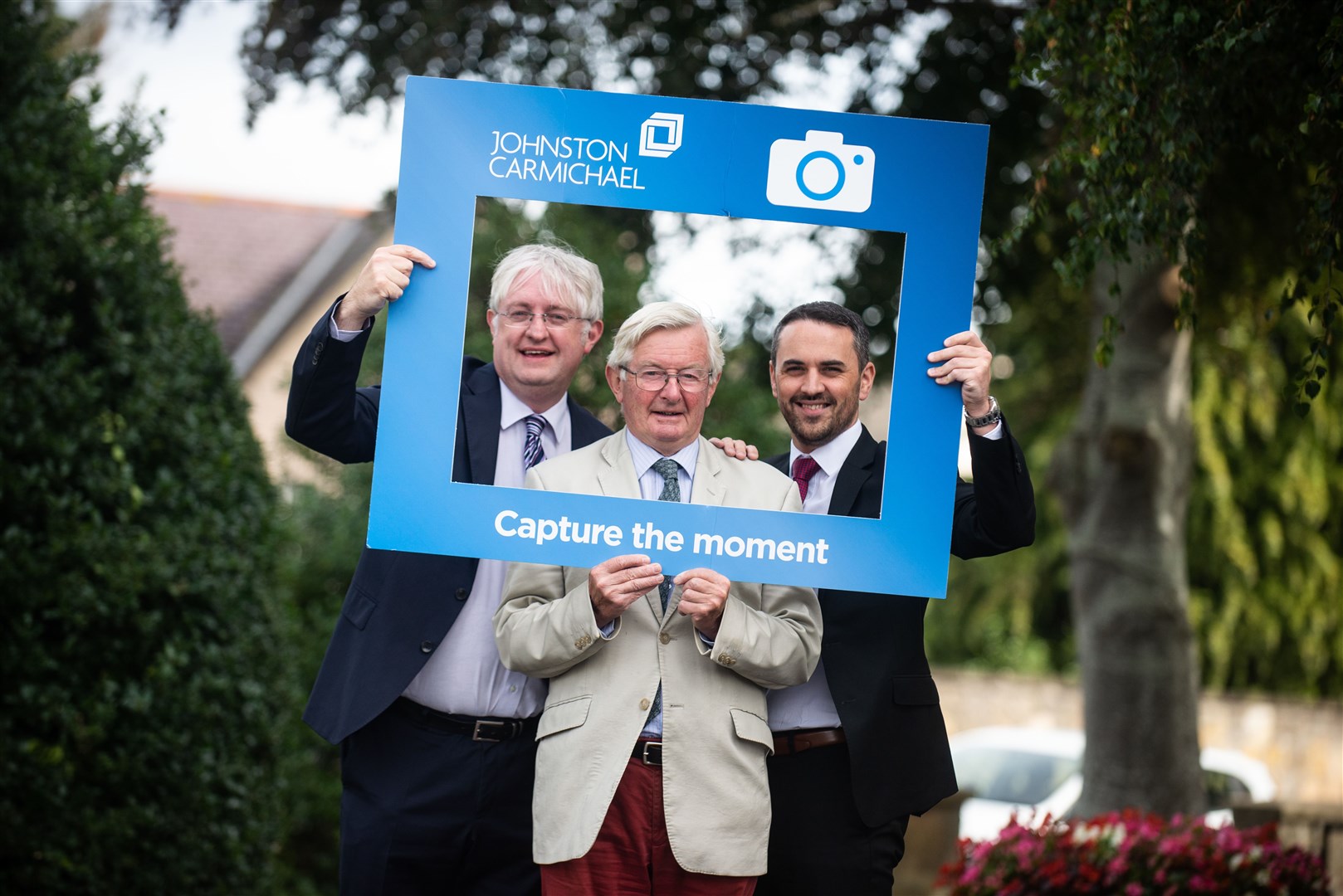 Moray's Lord Lieutenant Grenville Johnston (centre) returns to the firm his grandfather established to launch an anniversary photo competition with the Johnston Carmichael's Scott Jeffrey (left) and Scott Dunbar. Picture: Michael Traill.