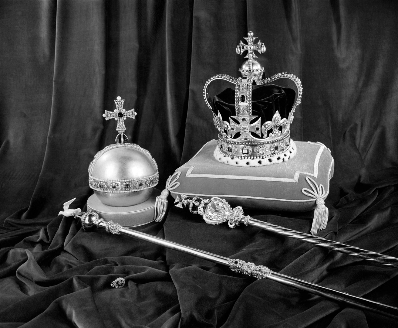 The Sceptre with Dove, front left, with St Edward’s Crown, the Orb, the Sceptre with Cross and the Sovereign’s Ring (PA)