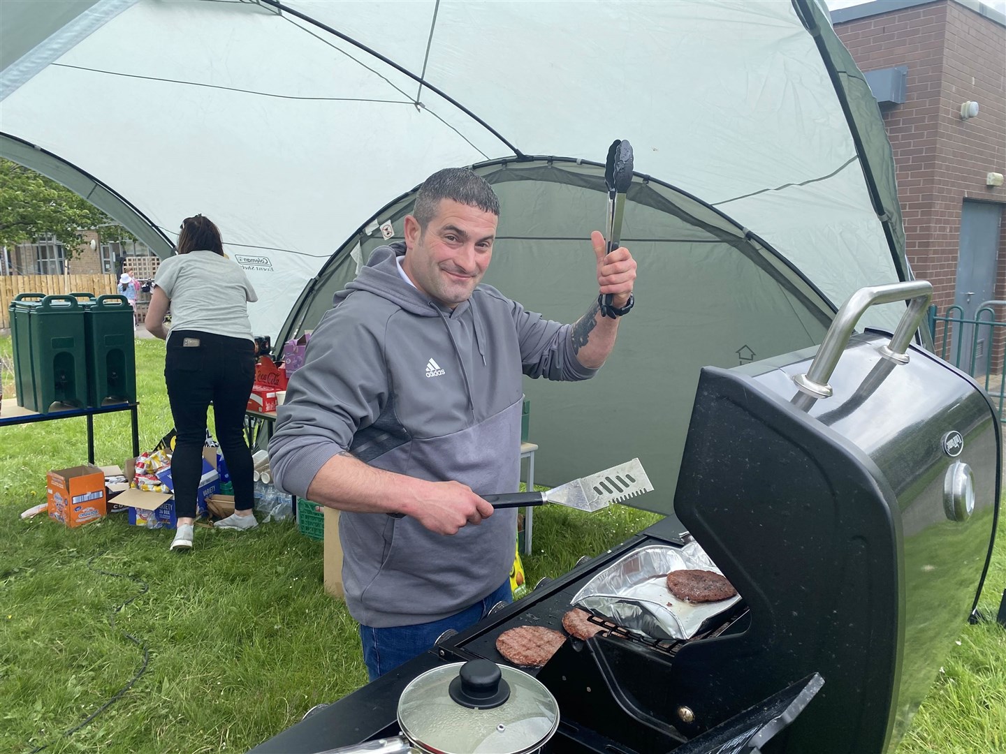 Service with a smile from Michael Ogilvie at the barbecue.