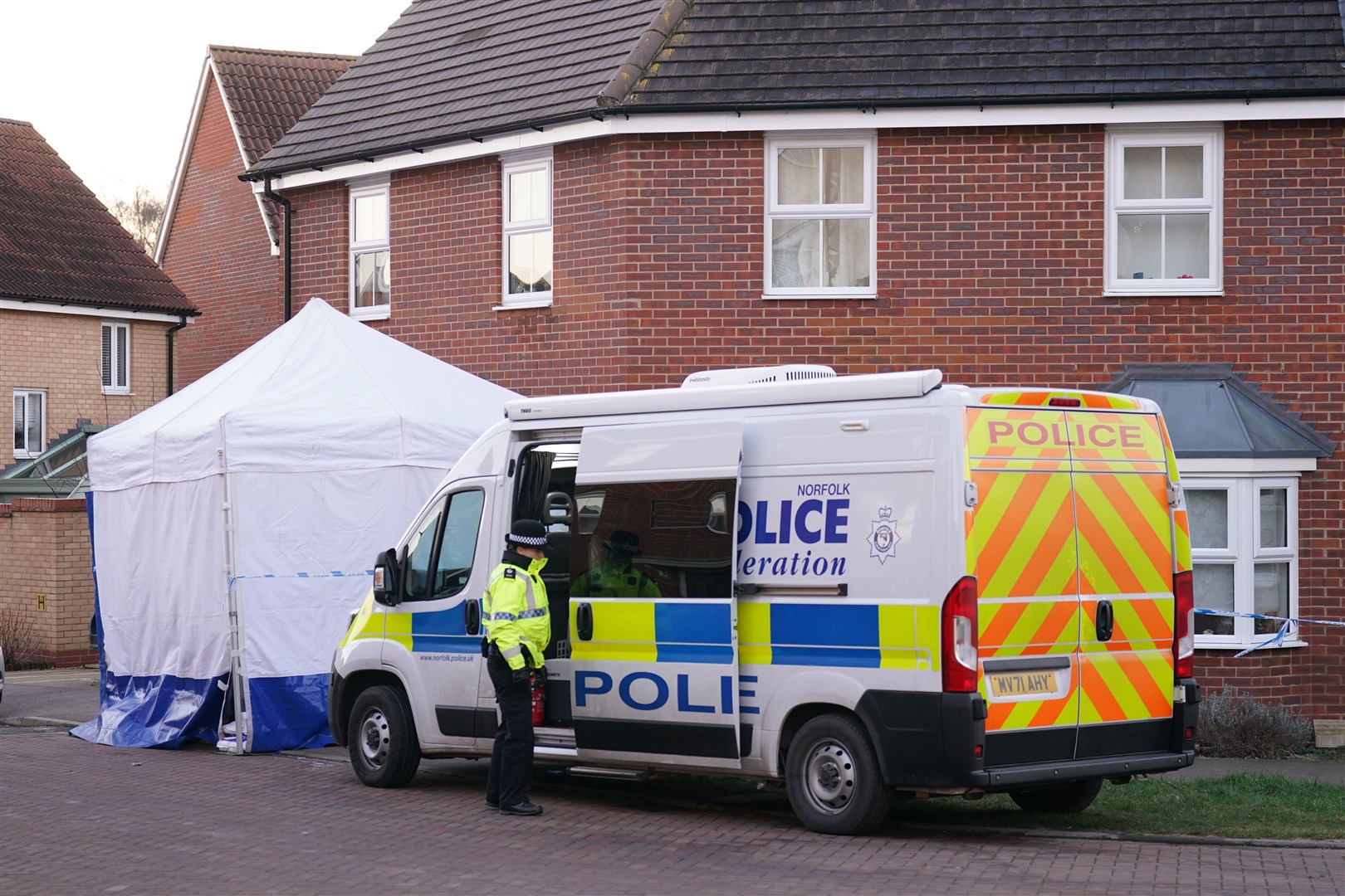 Police outside a house in Costessey near Norwich after four people were found dead inside the property. Norfolk Constabulary said officers forced their way into an address in Allan Bedford Crescent, Costessey, shortly before 7am following a call from a member of the public. The bodies of four people were found inside and the force believes they were all known to each other. Picture date: Friday January 19, 2024.