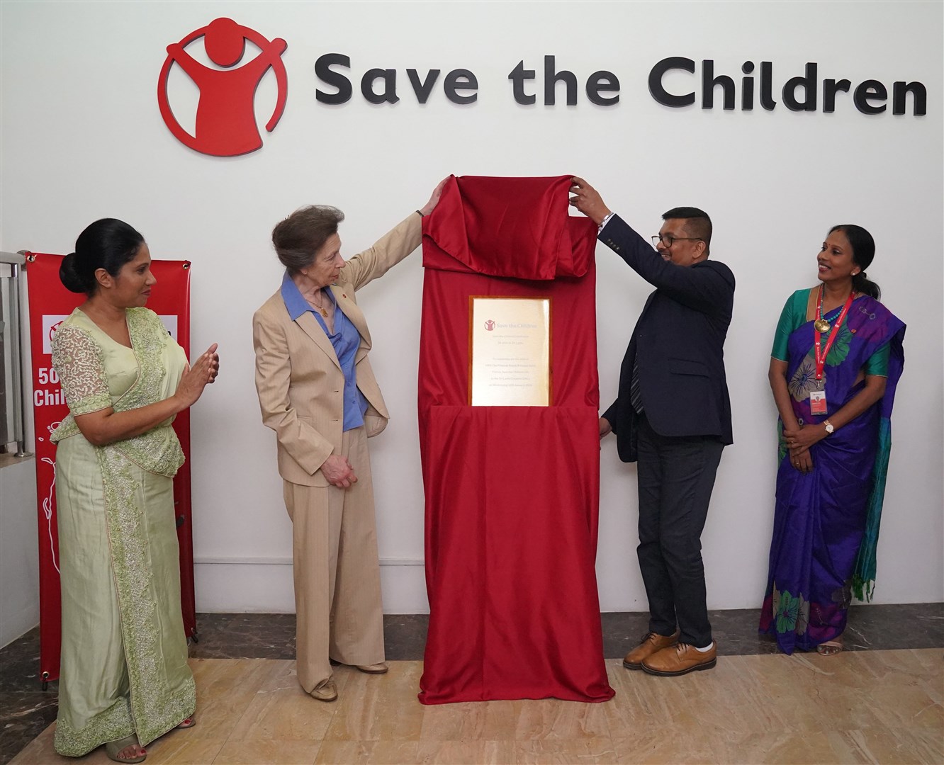The Princess Royal unveils a plaque during a visit to Save the Children’s HQ in Colombo, Sri Lanka (Jonathan Brady/PA)