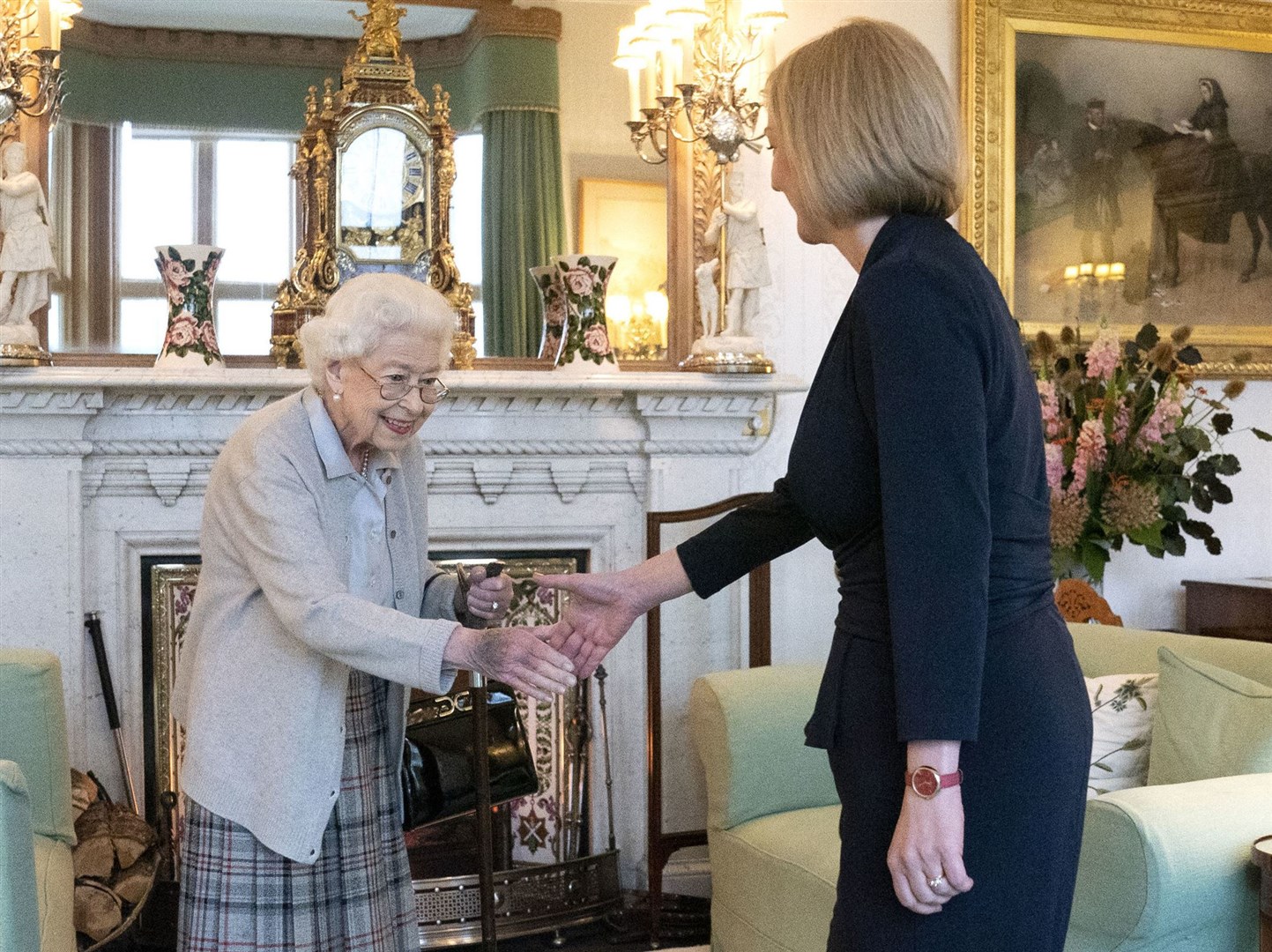 Liz Truss is welcomed by the Queen at Balmoral (Jane Barlow/PA)