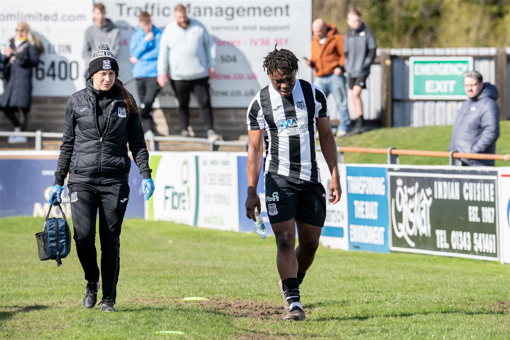 Another injury woe for Elgin City as Michael Dangana comes off in the first half. Elgin City FC (2) vs The Spartans (2) - SPFL League Two 23/24 - Borough Briggs, Elgin 06/04/24.Picture: Daniel Forsyth.