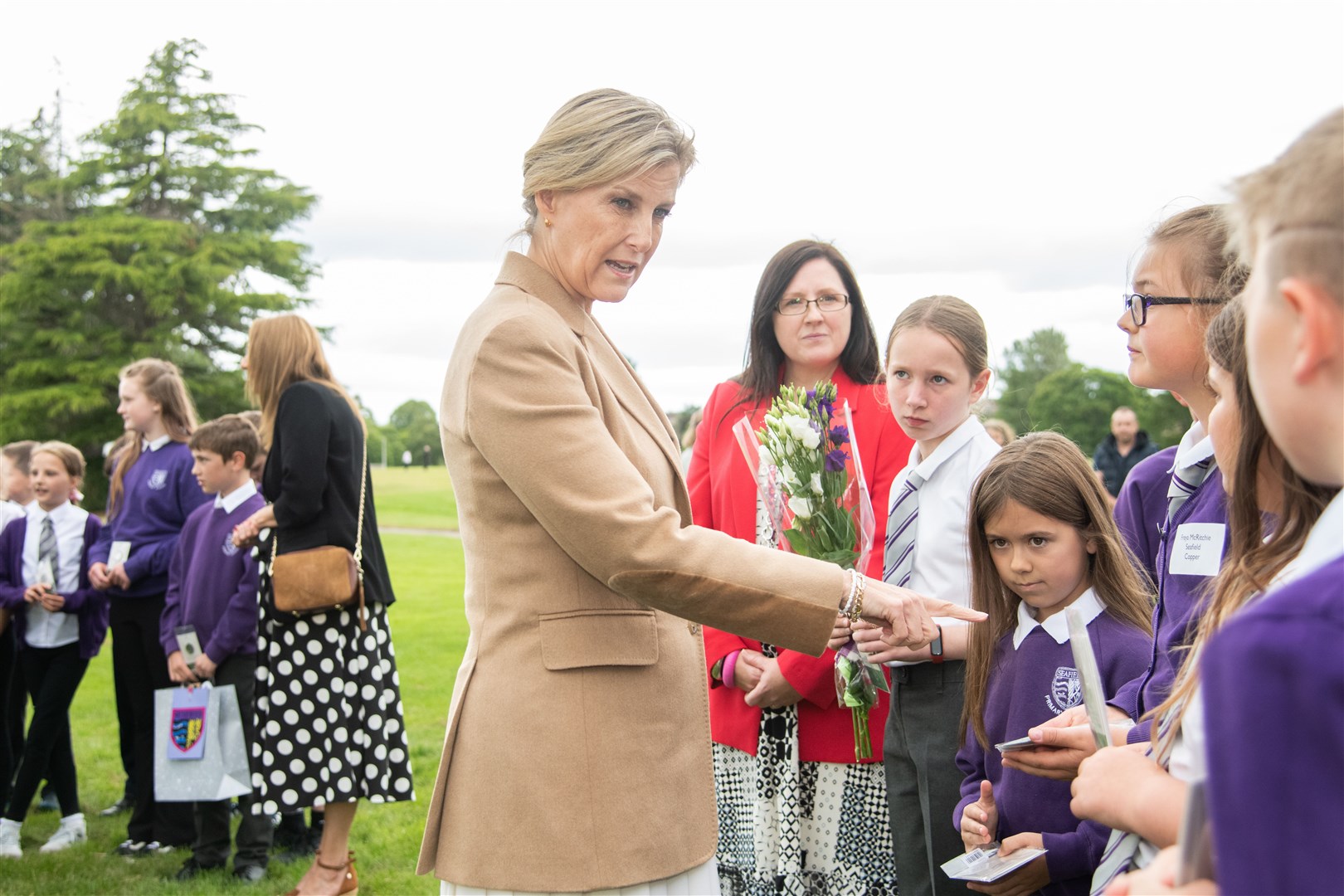 The Countess of Forfar talks to pupils from Seafield Primary School...The Earl and Countess of Forfar, which Prince Edward and Sophie are known as in Scotland, visit Cooper Park in Elgin...Picture: Daniel Forsyth..