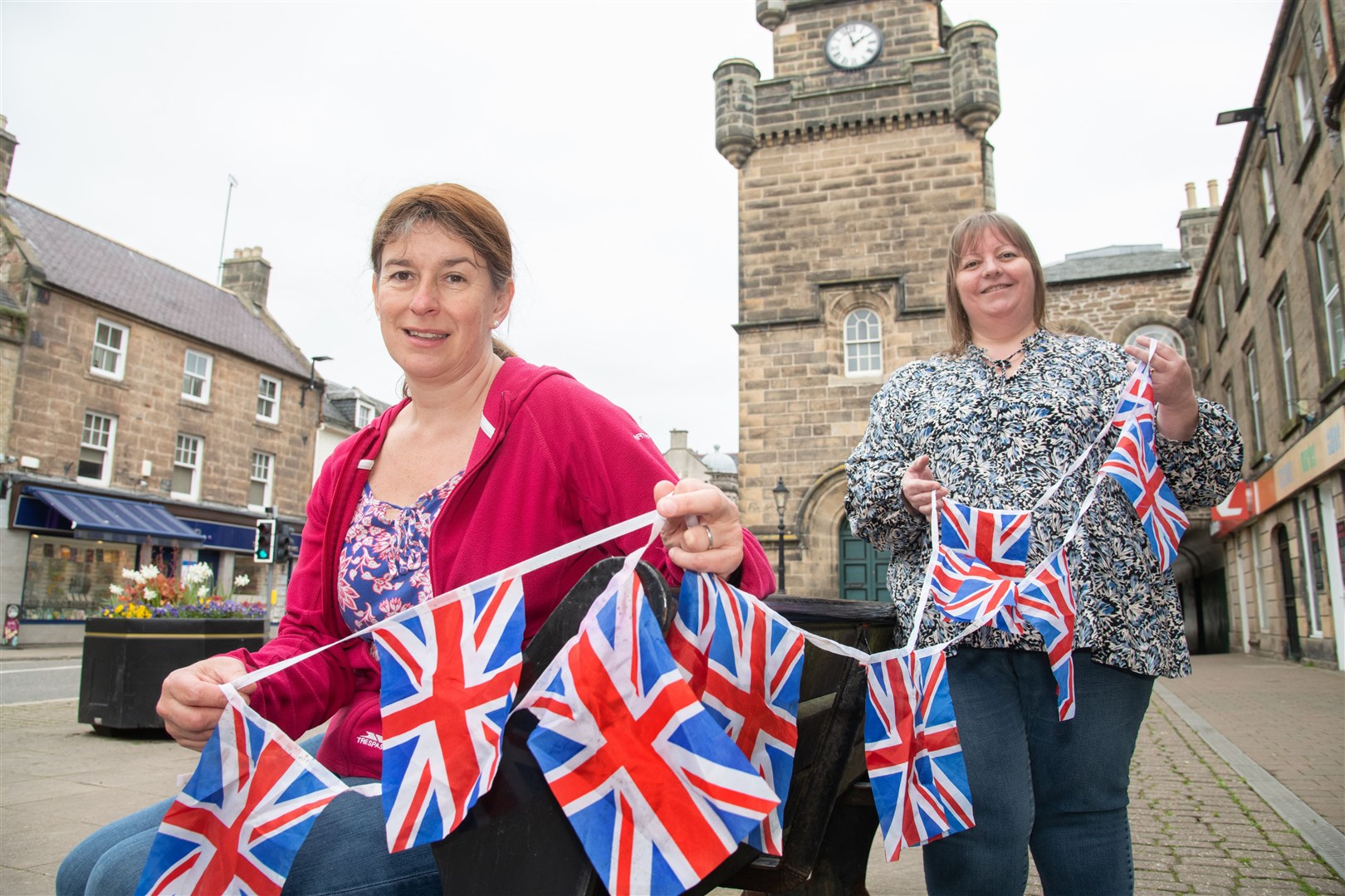 Kathleen Robertson (left) and Rachel Philp get ready for the jubilee celebrations in Forres. Picture: Daniel Forsyth
