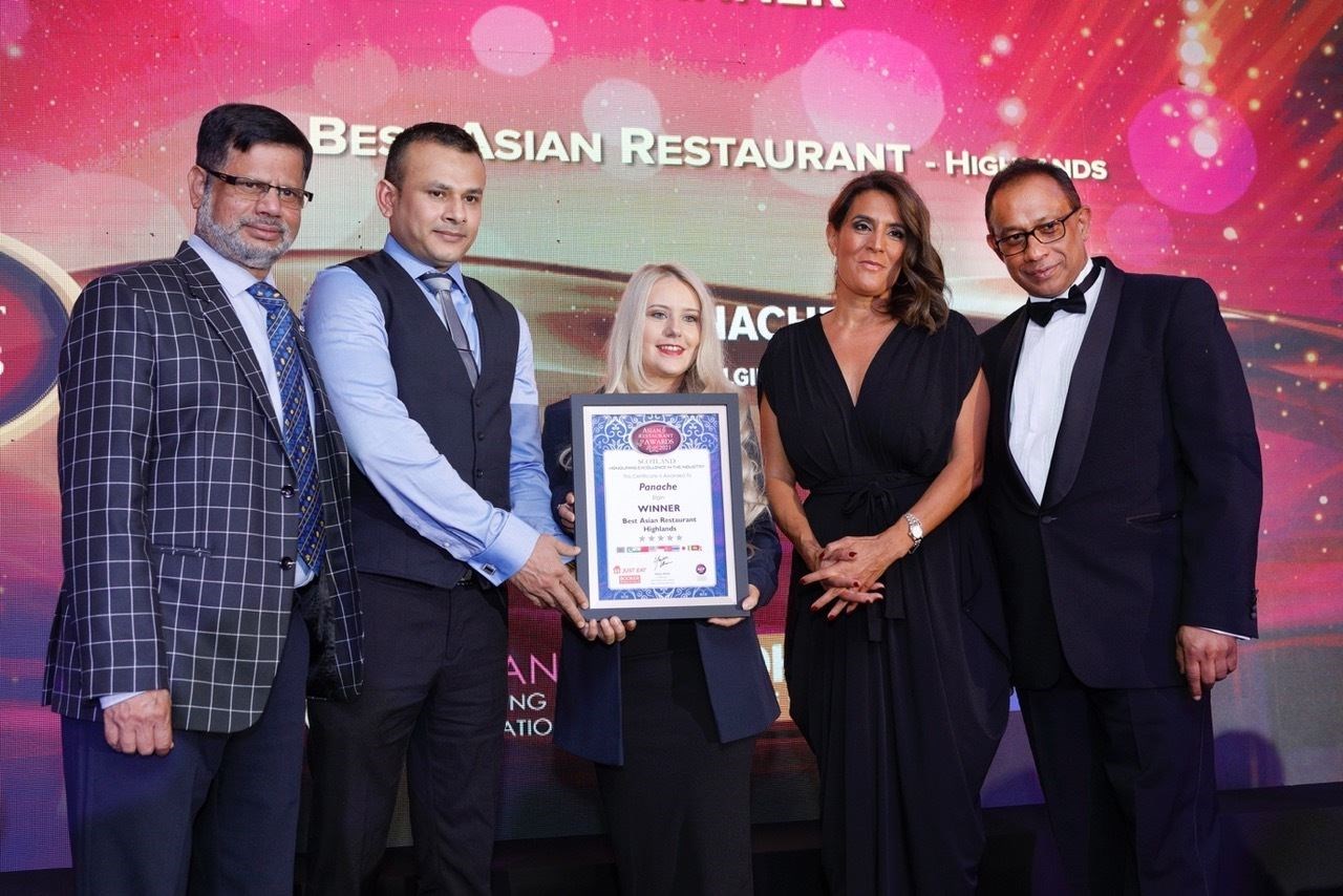 There to present the award were (l-r) Dr Wali Tasar Uddin MBE, BBC News anchor Samantha Simmonds and chairman of the Asian Catering Federation Yawar Khan.