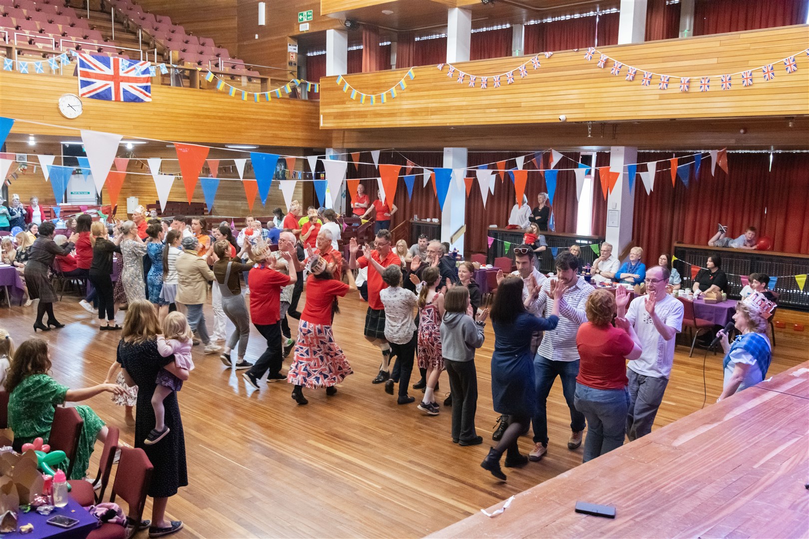 Ceilidh dancing at Elgin Rotary's Coronation Lunch at Elgin Town Hall.Picture: Beth Taylor.