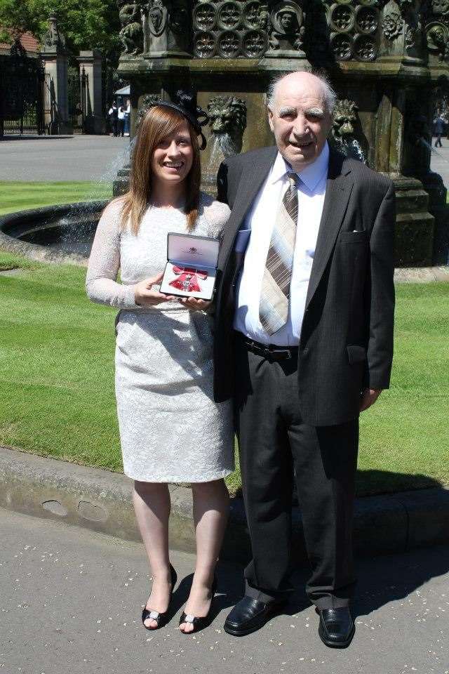 Angie Shearer with her Grandad Eck Thomson on the day she received the MBE.
