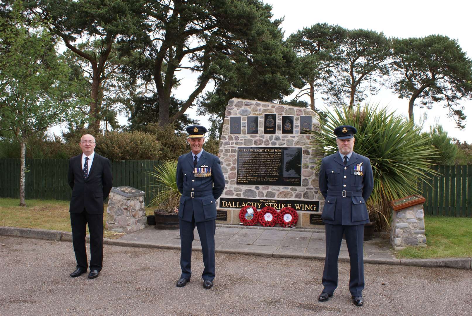 Paying their respects at the Canada Day service held at Dallachy Strike Wing memorial are (from left) Councillor Marc Macrae, Deputy Lord Lieutenant for Moray Alistair Monkman CBE DL MA and Squadron Leader Dougie Potter.