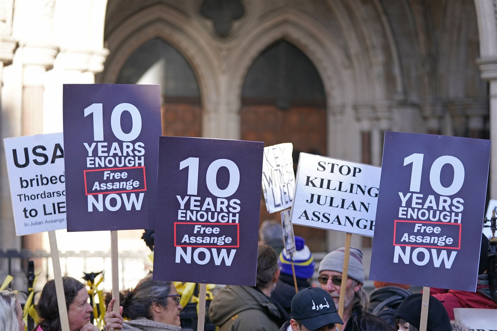 Supporters of Julian Assange demonstrate outside the Royal Courts of Justice (Kirsty O’Connor/PA)