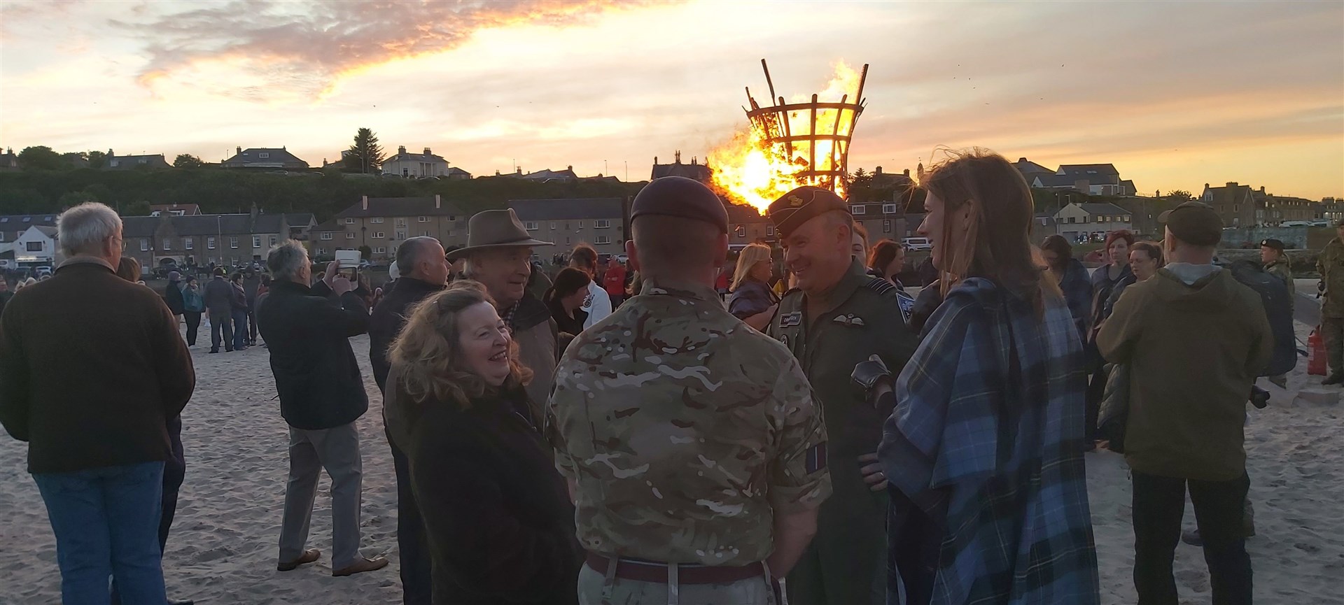 Group Captain Chris Layden, Station Commander of RAF Lossiemouth, with the beacon in the background.