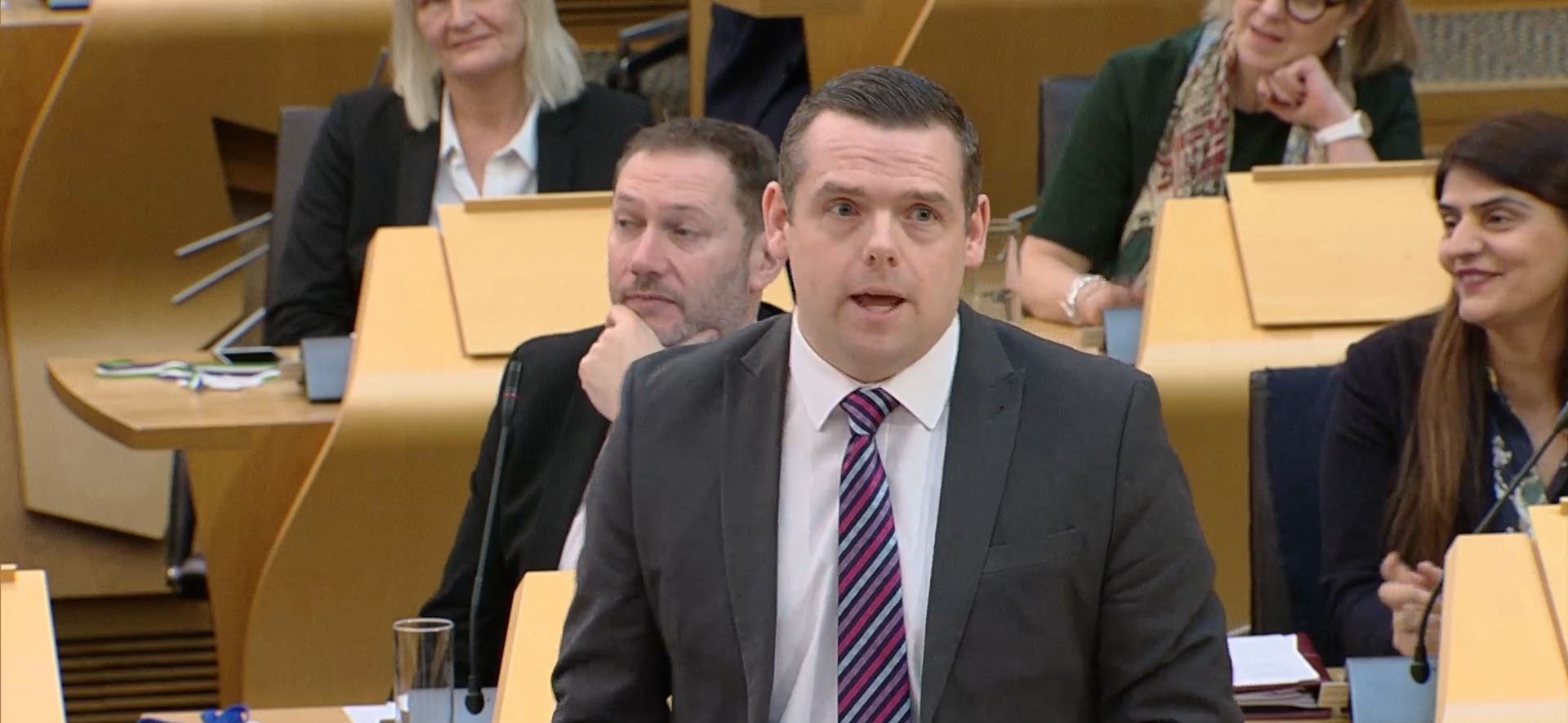 Moray MP Douglas Ross has challenged the government over Scotland's PISA results.