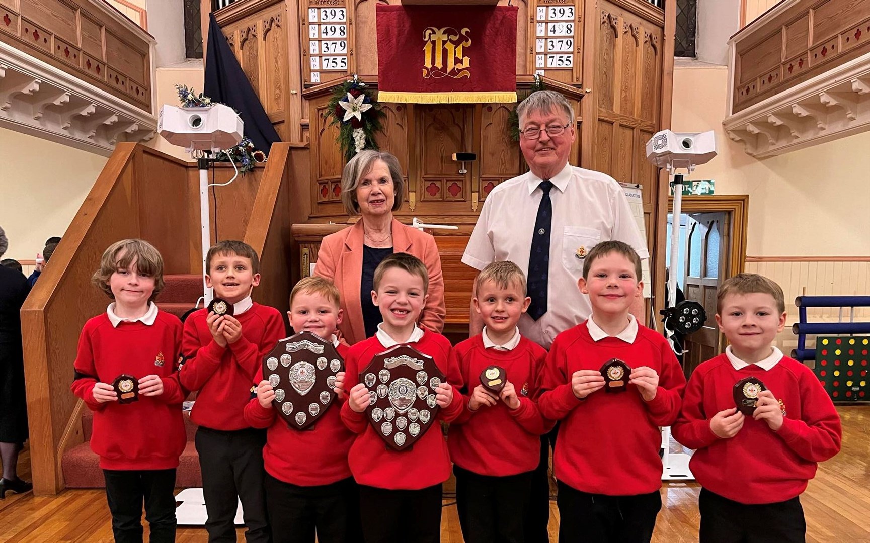 The Anchor Boys with their prizes, joined by Ruth Rollo and Captain Alan McIntosh. Picture: Buckie BB