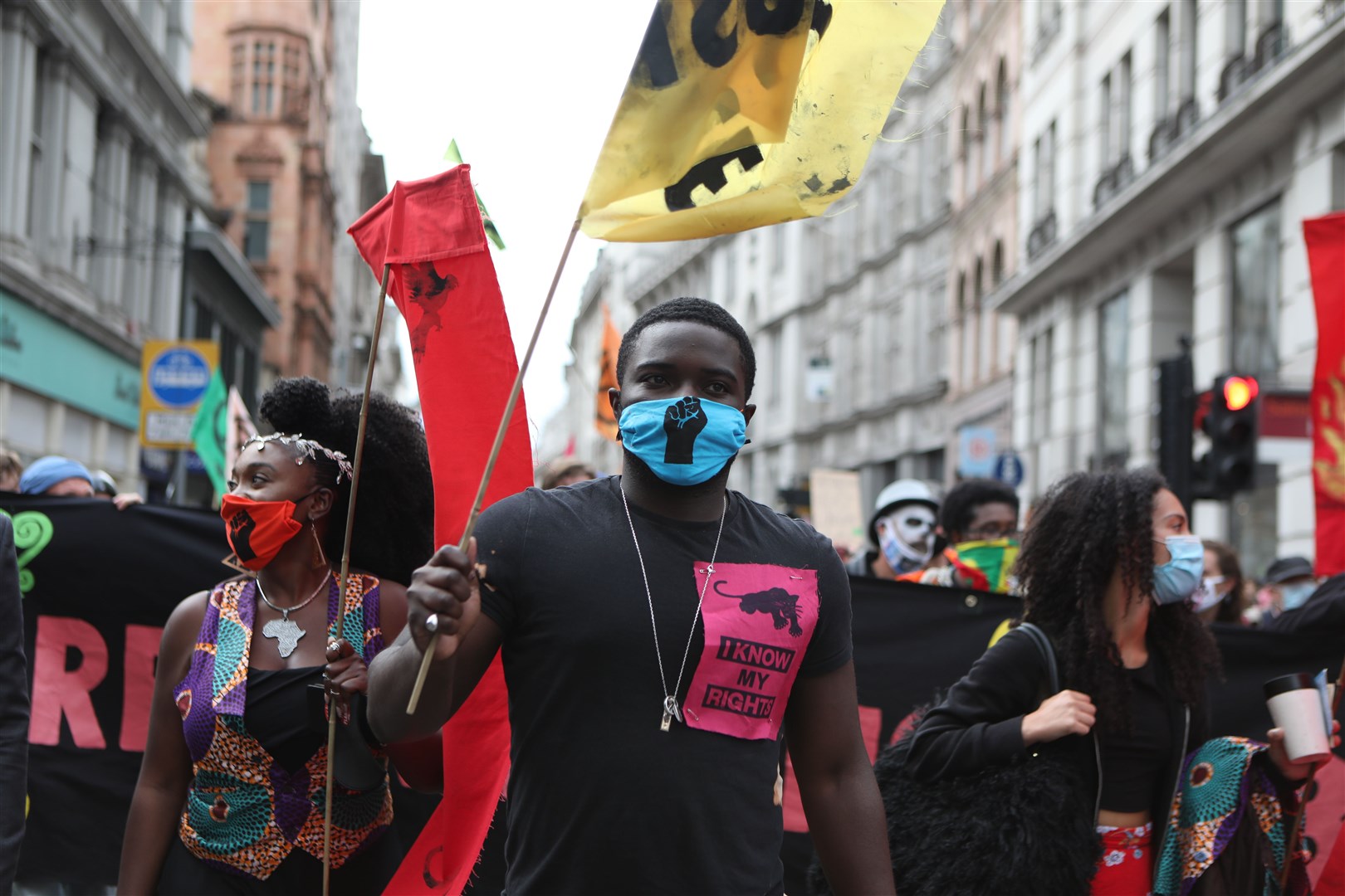 Protesters walking through the City of London (Luciana Guerra/PA)
