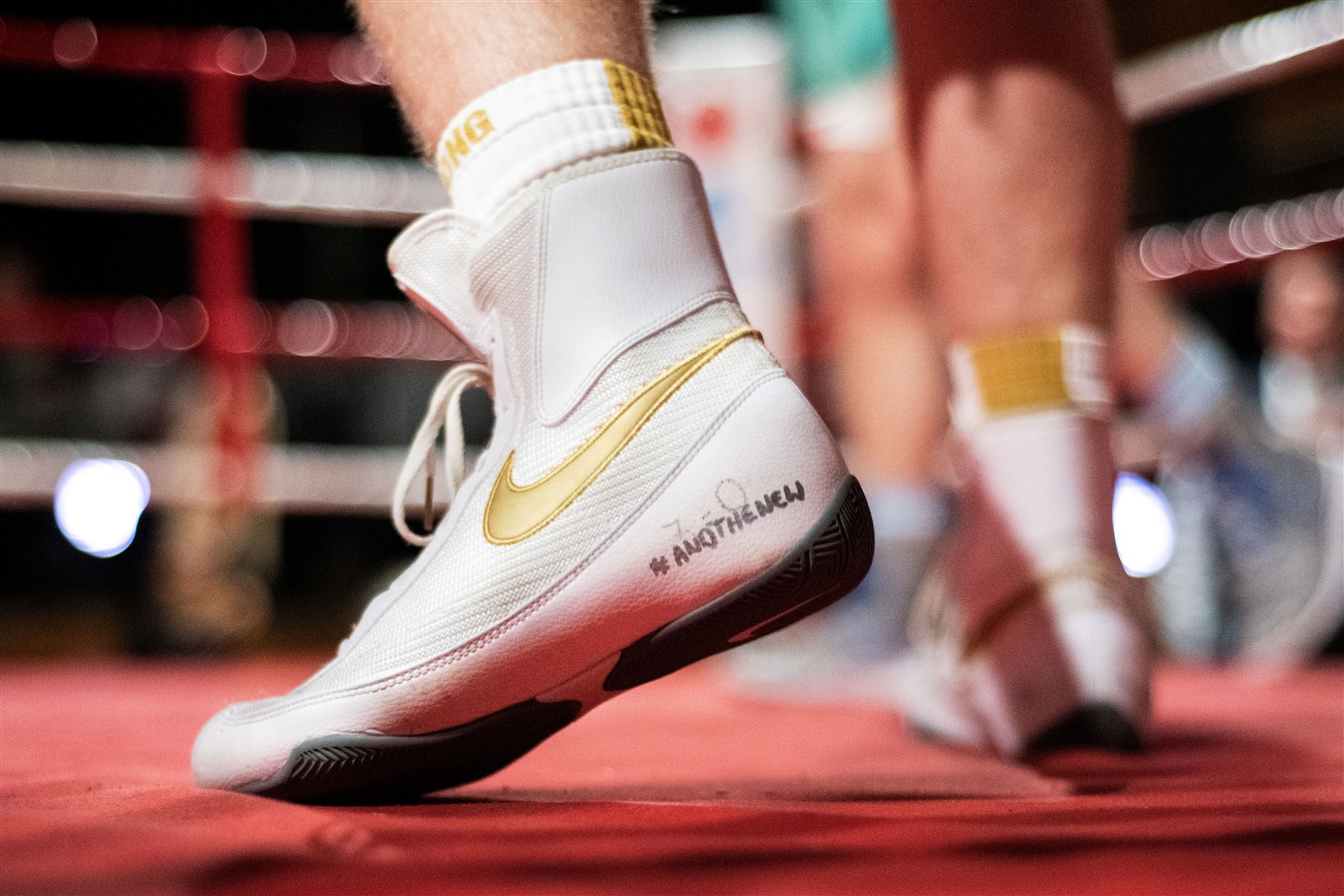 'And the new.......Scottish super-welterweight title champ's prediction on his boxing shoe proved to be correct. Picture: Daniel Forsyth..