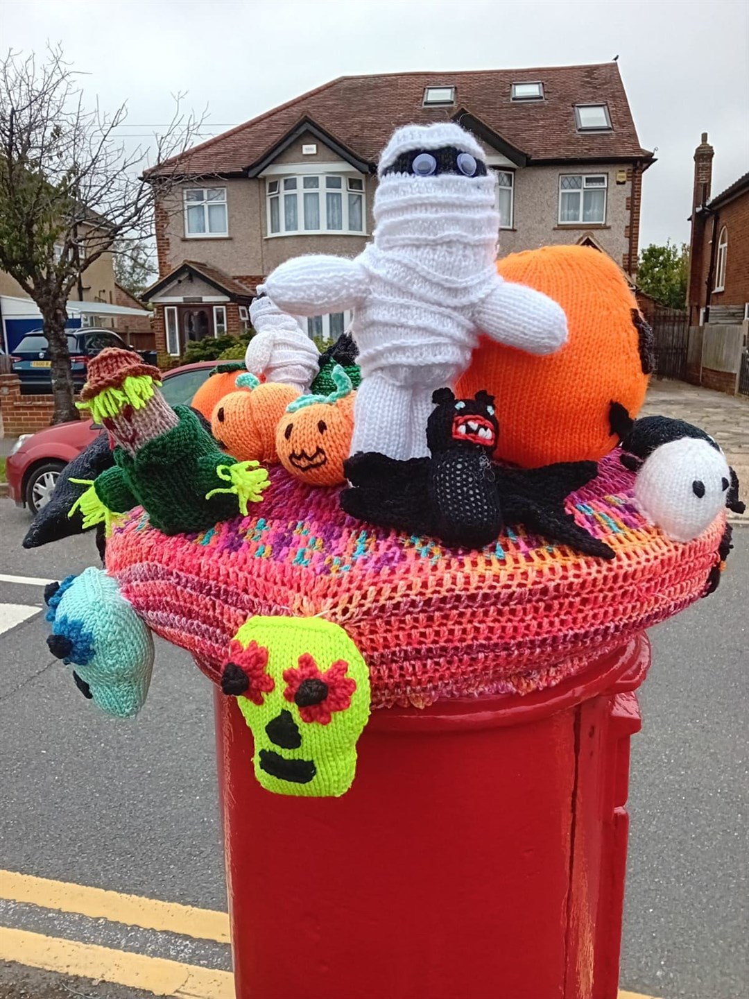 The items on Brenda Fowler’s topper include a mummy and pumpkin (Brenda Fowler/PA)