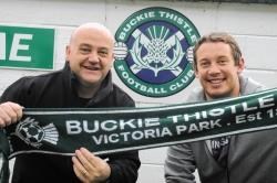 Record Buckie signing Mark Chisholm (right), pictured with club president Mark Duncan.