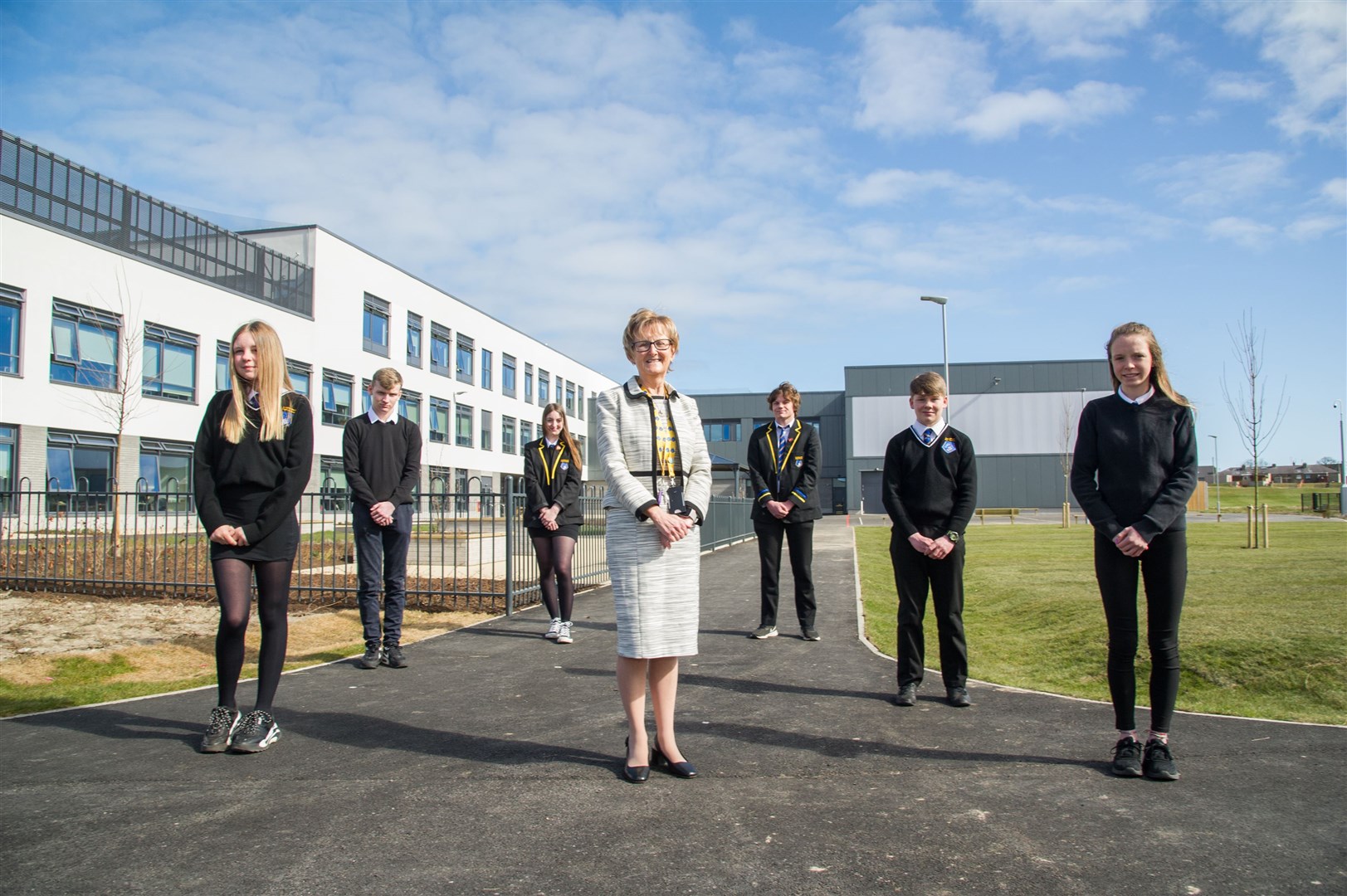 Headteacher Janice Simpson with pupils from every year group at the new Lossiemouth High School, which officially opened on Wednesday. Picture: Becky Saunderson.