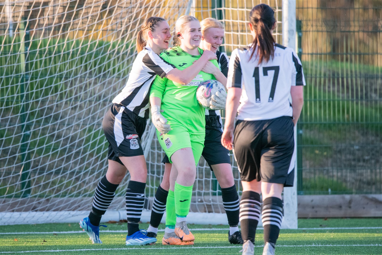 Elgin goalkeeper Maizy Mcafee celebrates with her team mates after she saved a first half penalty...Elgin City FC Women (5) vs Arbroath FC Women (2) - SWFL North League 23/24 - Gleaner Arena, Elgin 05/11/2023...Picture: Daniel Forsyth..