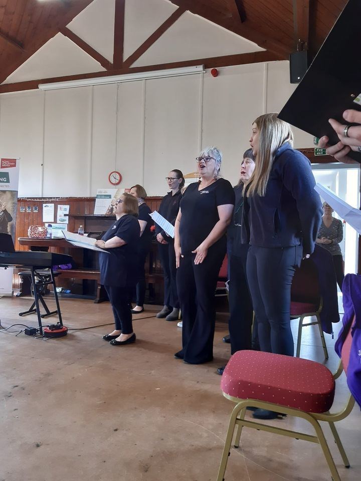 Moray's over 55's enjoyed a singing workshop with Kinloss Military Wives Choir