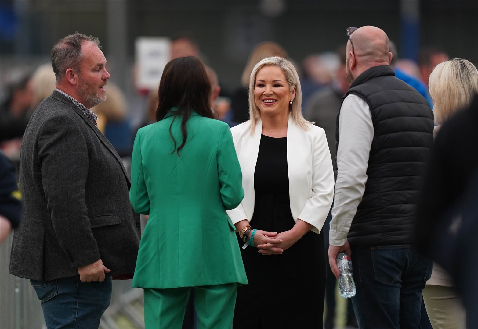 Michelle O’Neill talks to party colleagues (Niall Carson/PA)