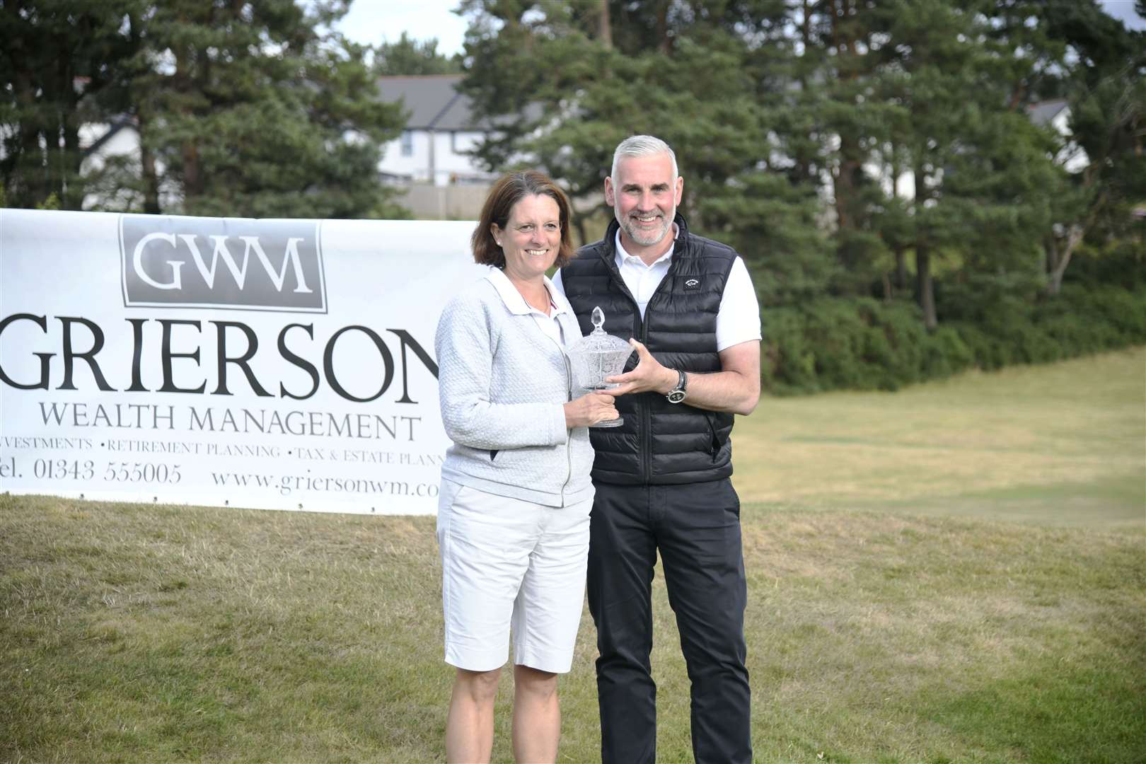 Fiona Black being presented her trophy, The Ladies Handicap Vase, by Martin Grierson...Elgin Five Day Open 2022...Picture: Beth Taylor.
