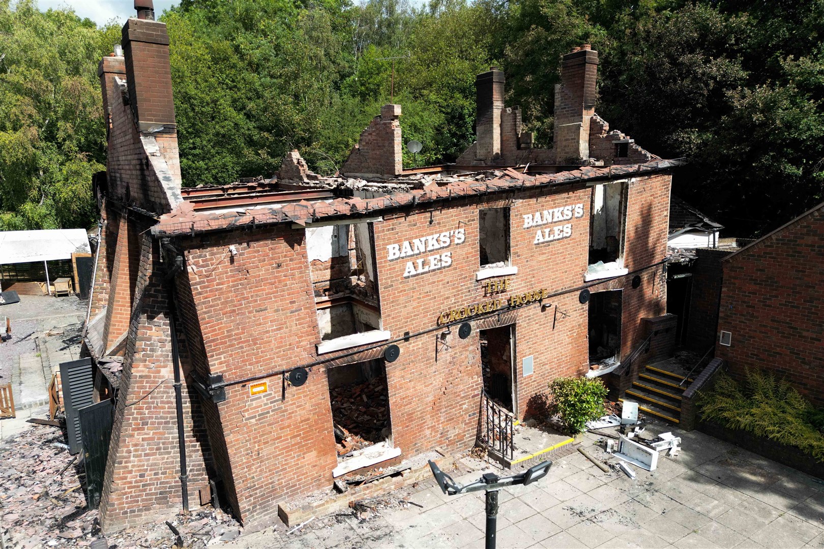 The fire at the Crooked House needed 30 firefighters to extinguish it (Jacob King/PA)