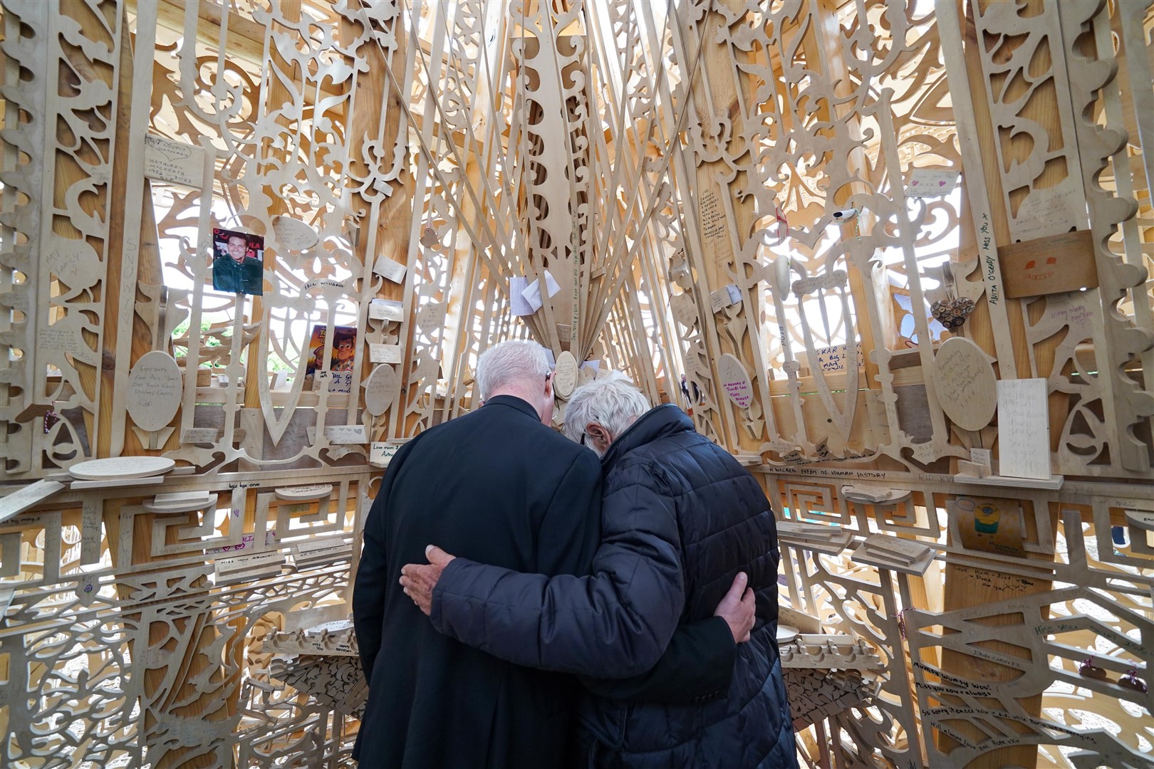 The archbishop was embraced by artist David Best during his visit (Jacob King/PA)