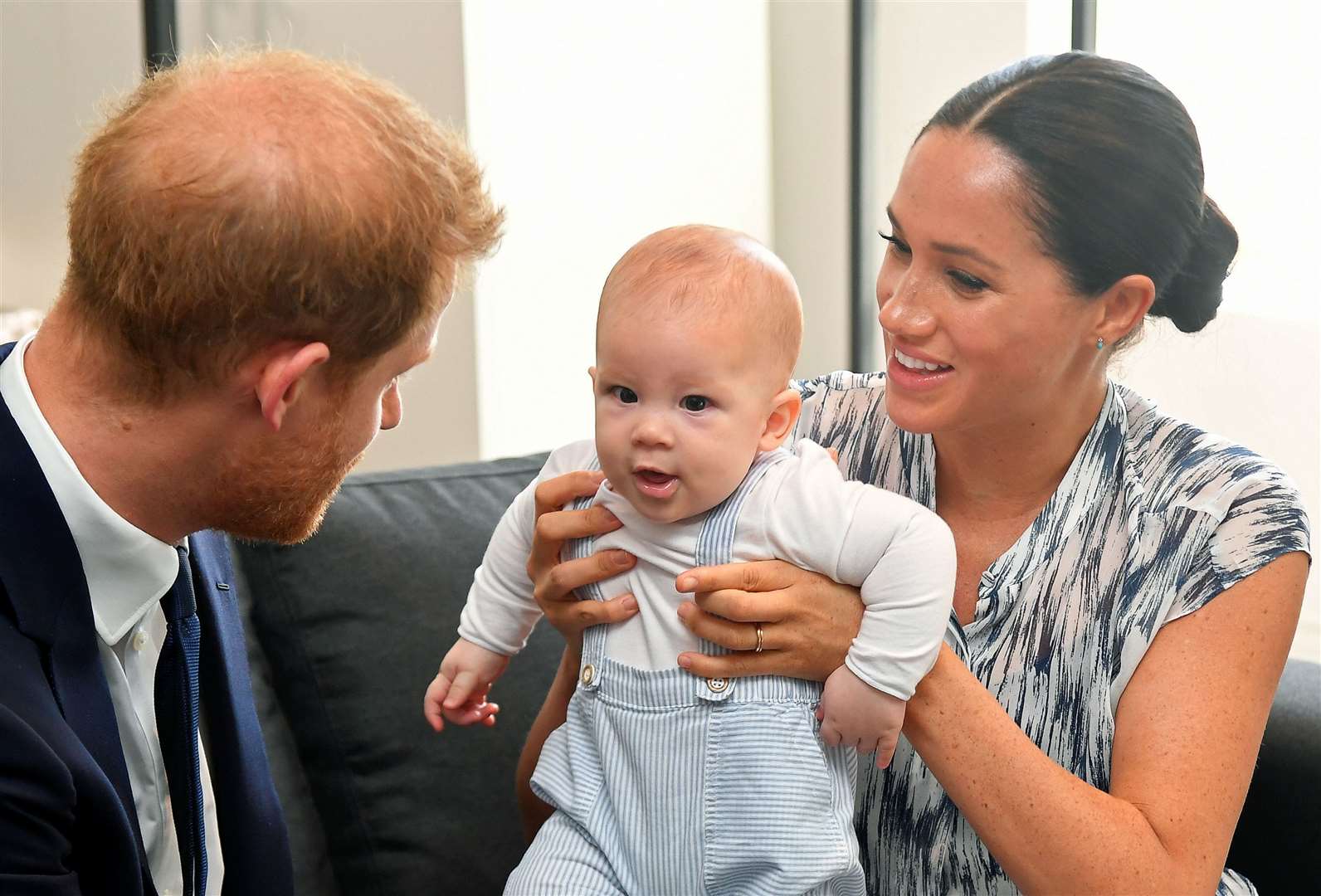 Harry and Meghan with Archie (Toby Melville/PA)
