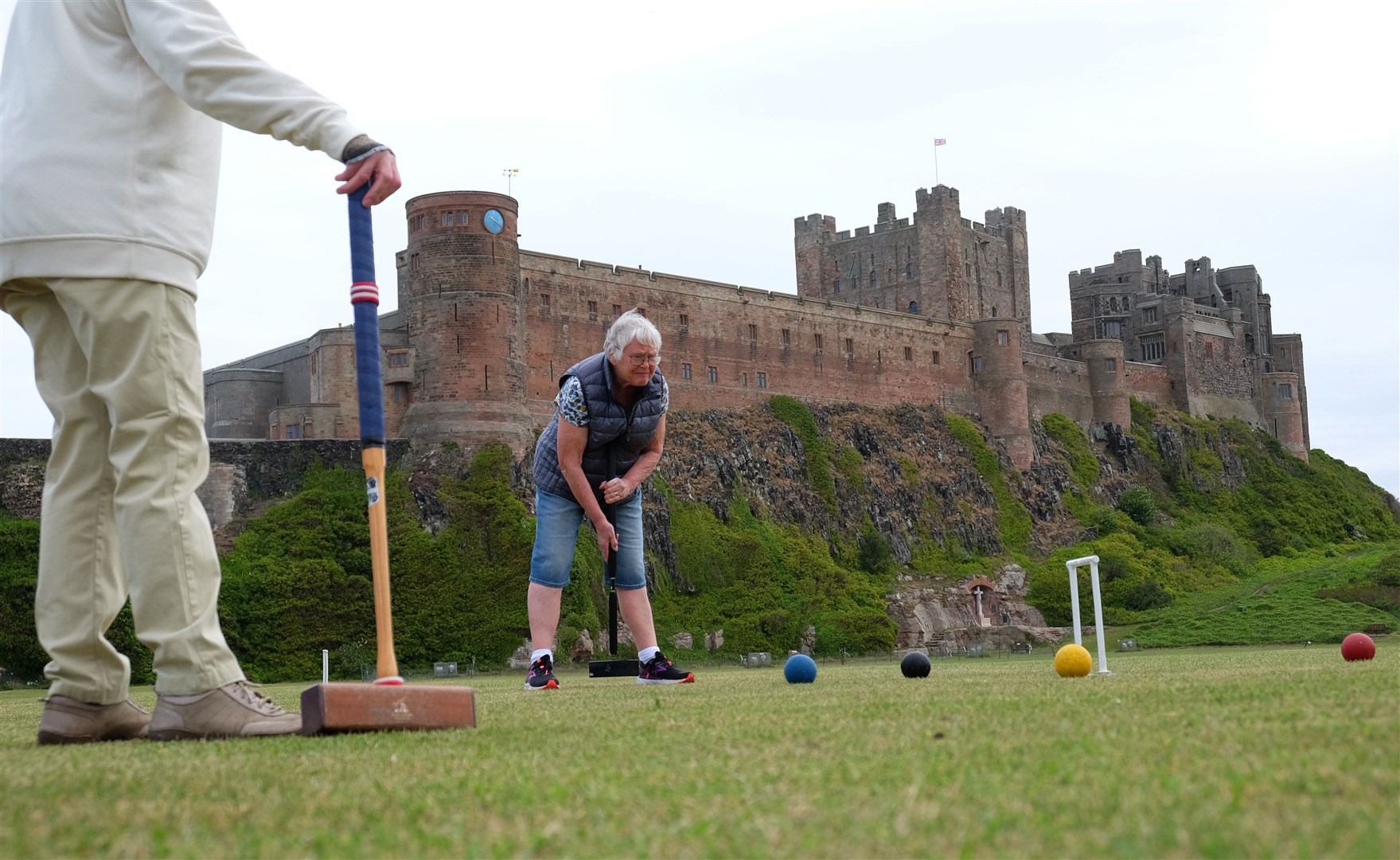 Women play croquet at Bamburgh in Northumberland after the relaxation of the previous lockdown (Owen Humphreys/PA)
