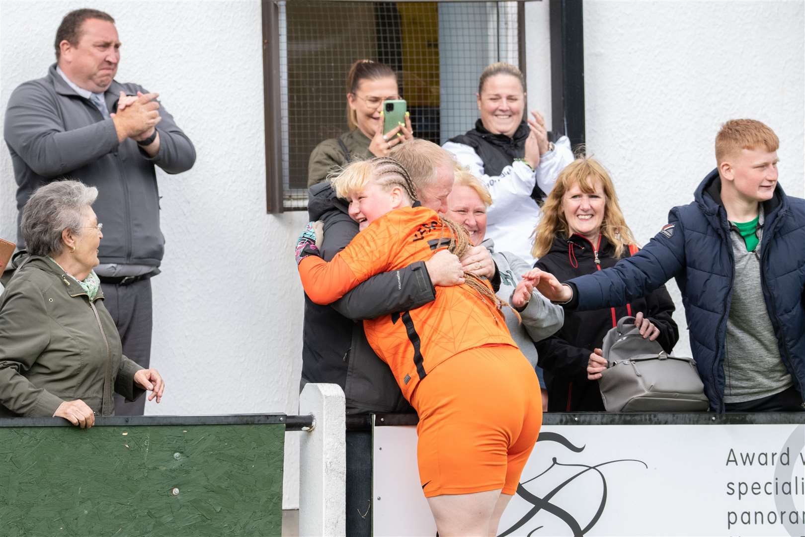 Buckie keeper Sophia Golebiewski celebrates the cup victory with her family. Picture: Daniel Forsyth