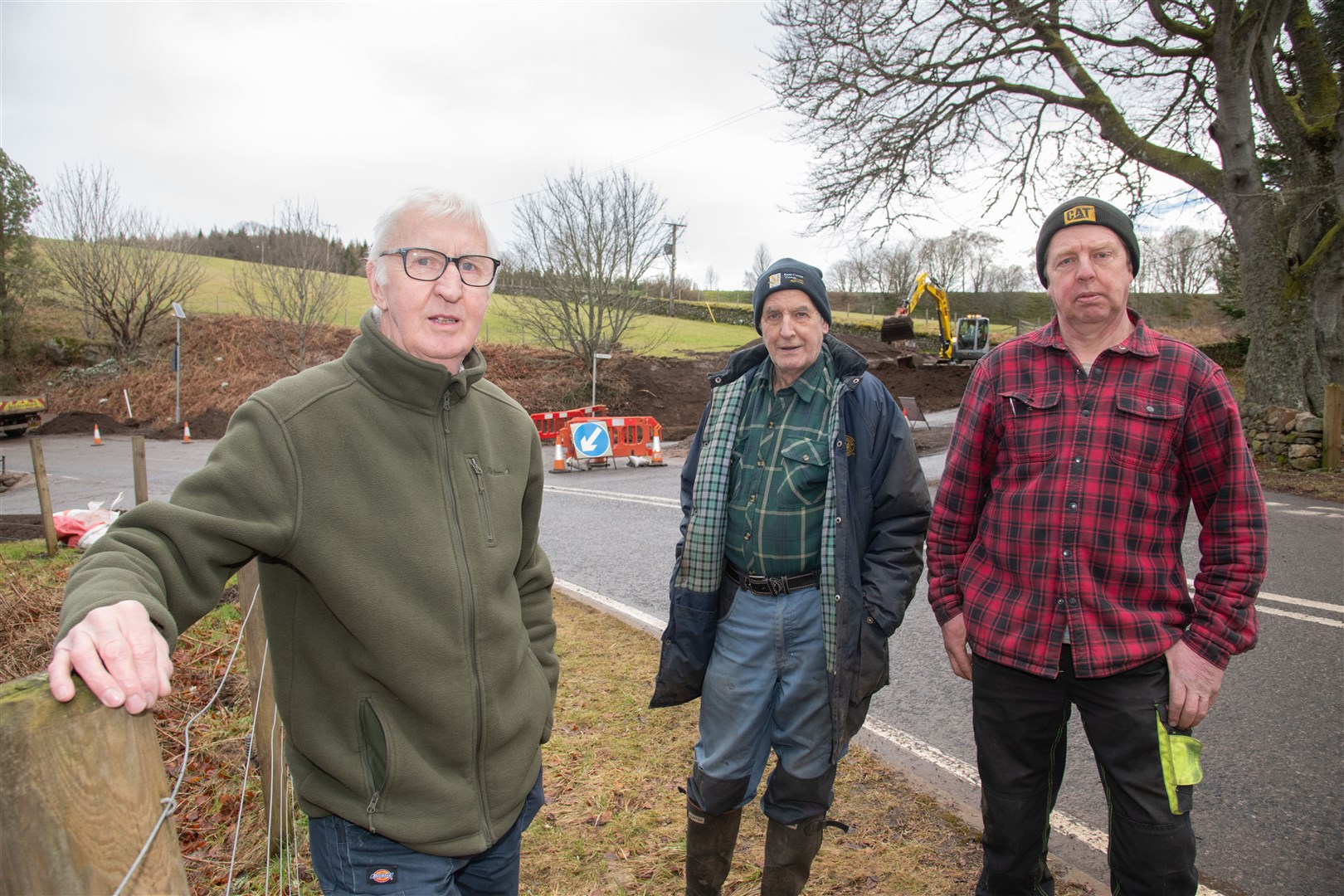 From left; David Swan, Davie Munro and Andy Munro...Locals have called on the council to stop construction work at a junction near Edinkillie Church and listen to them for what needs done to improve the junction. ..Picture: Daniel Forsyth..