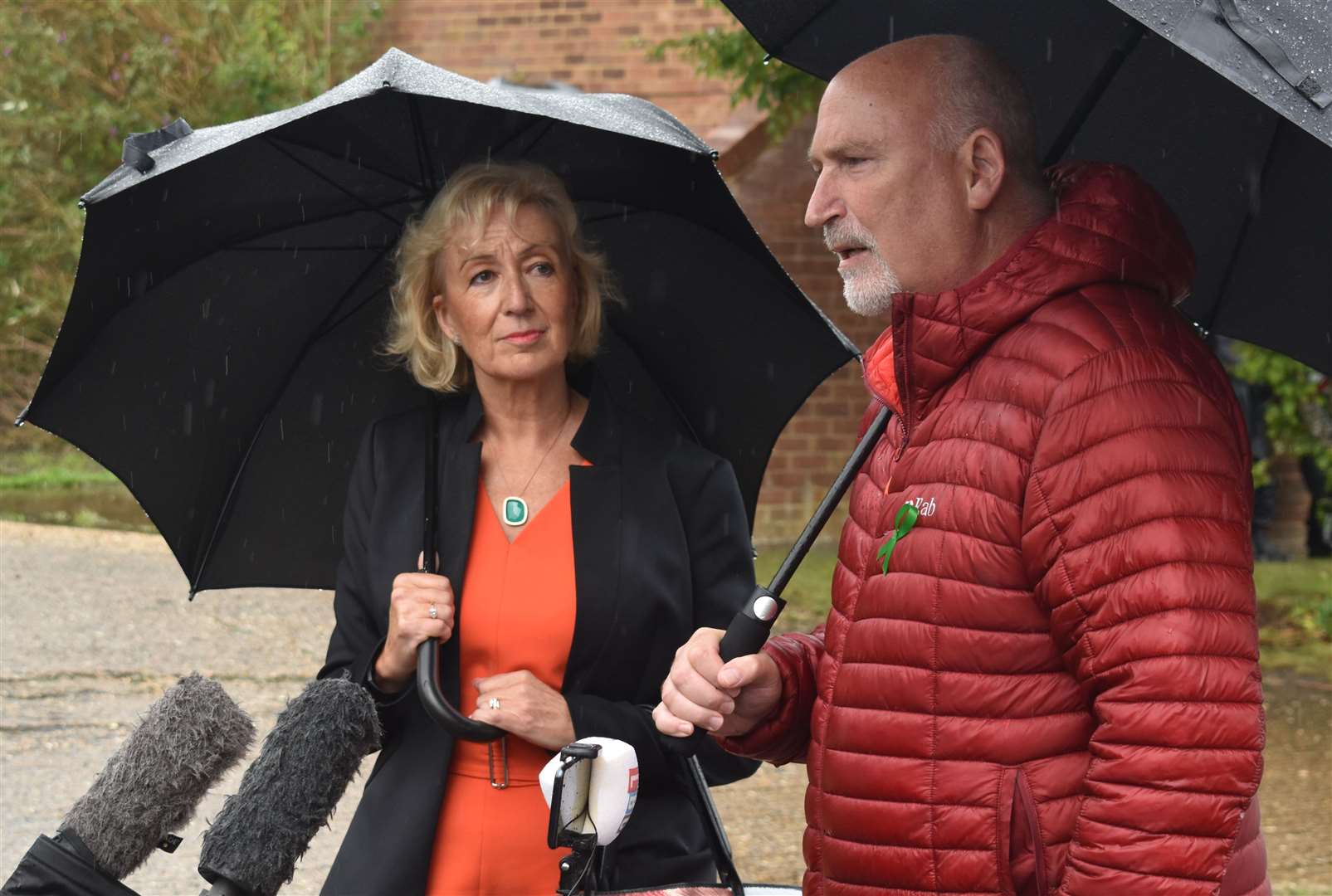 Andrea Leadsom MP and Harry Dunn family spokesman Radd Seiger speak to the media in Brackley, Northamptonshire (Matthew Cooper/PA)